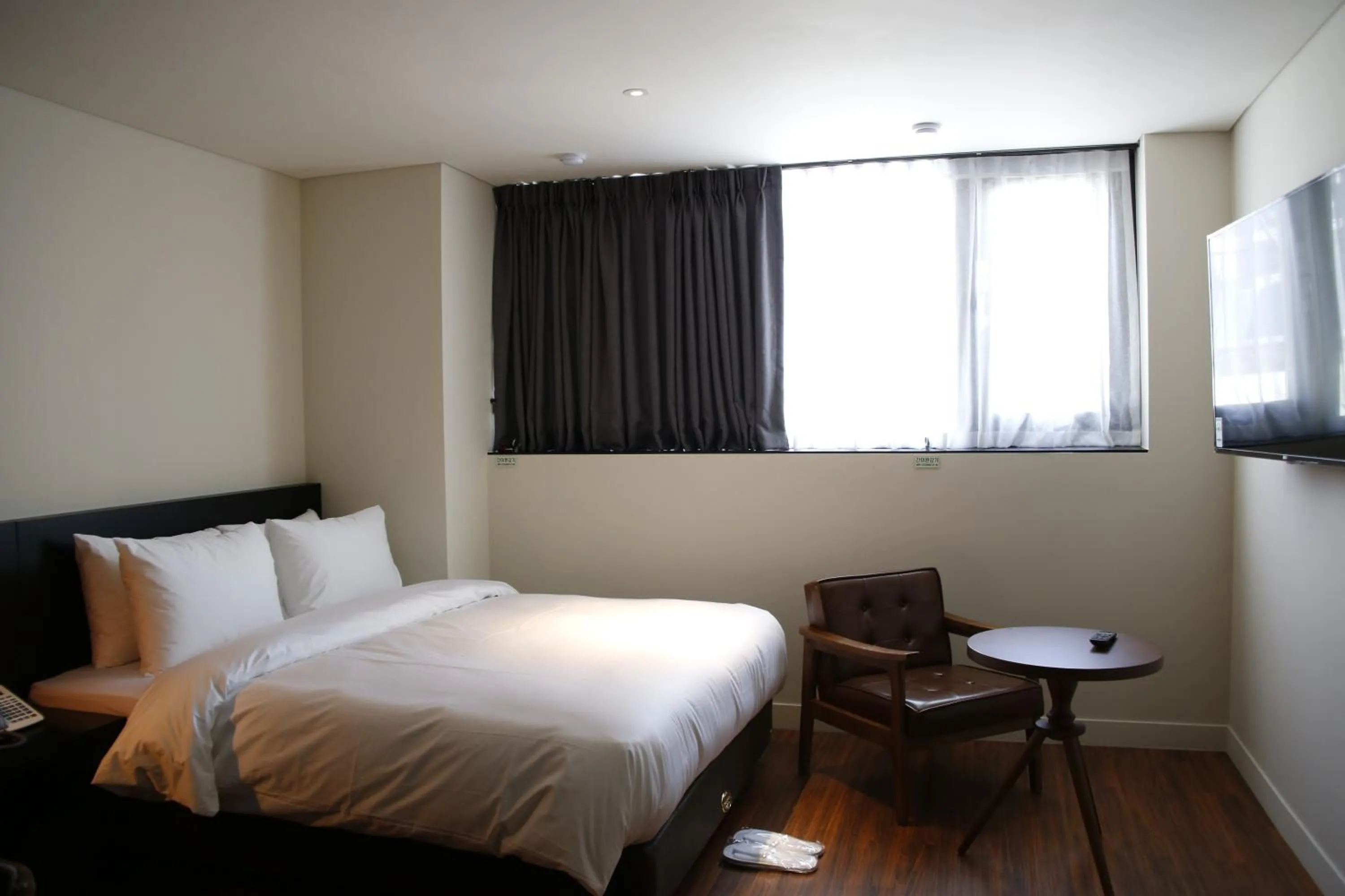 Bed in Rivertain Hotel