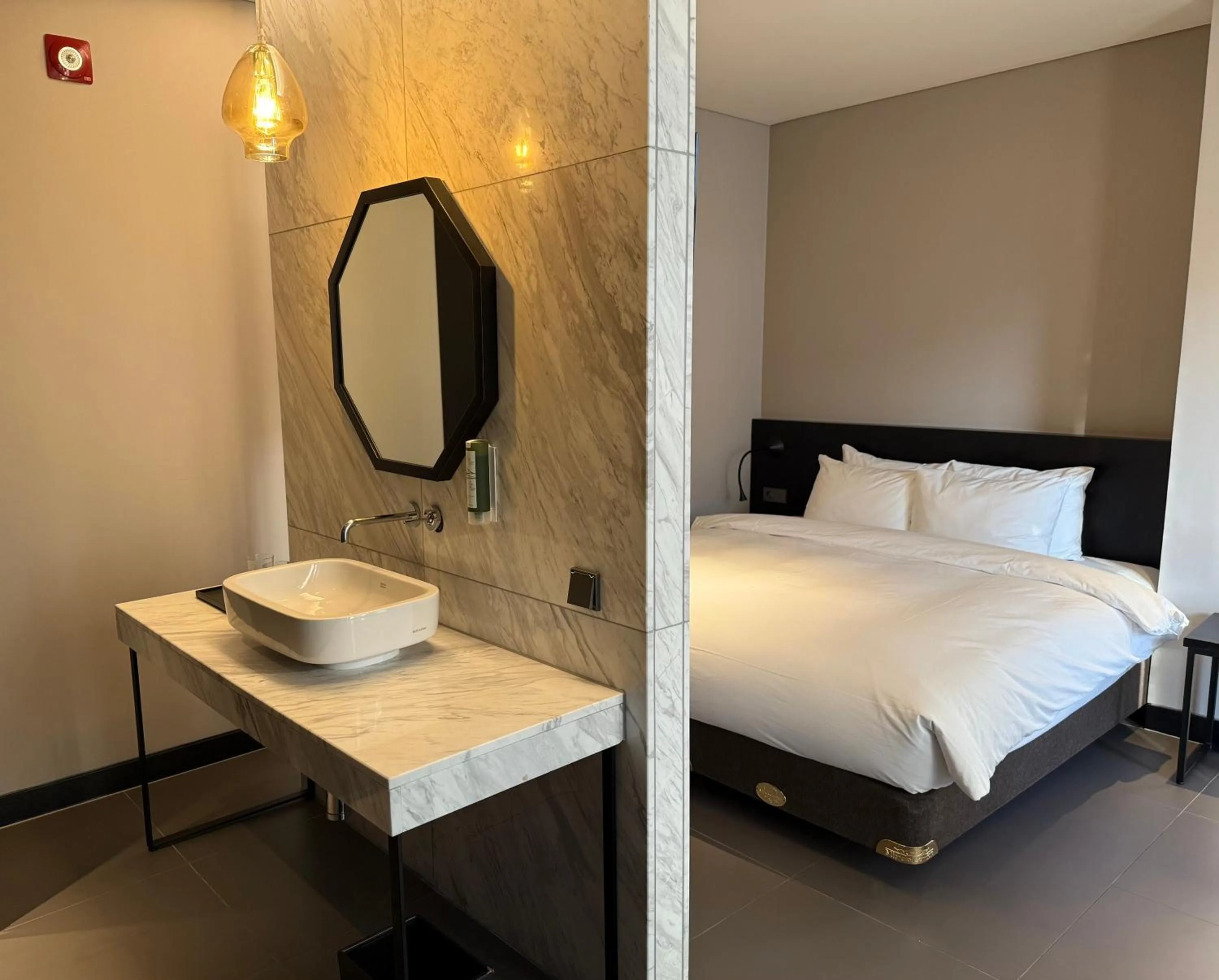 Bed in Rivertain Hotel