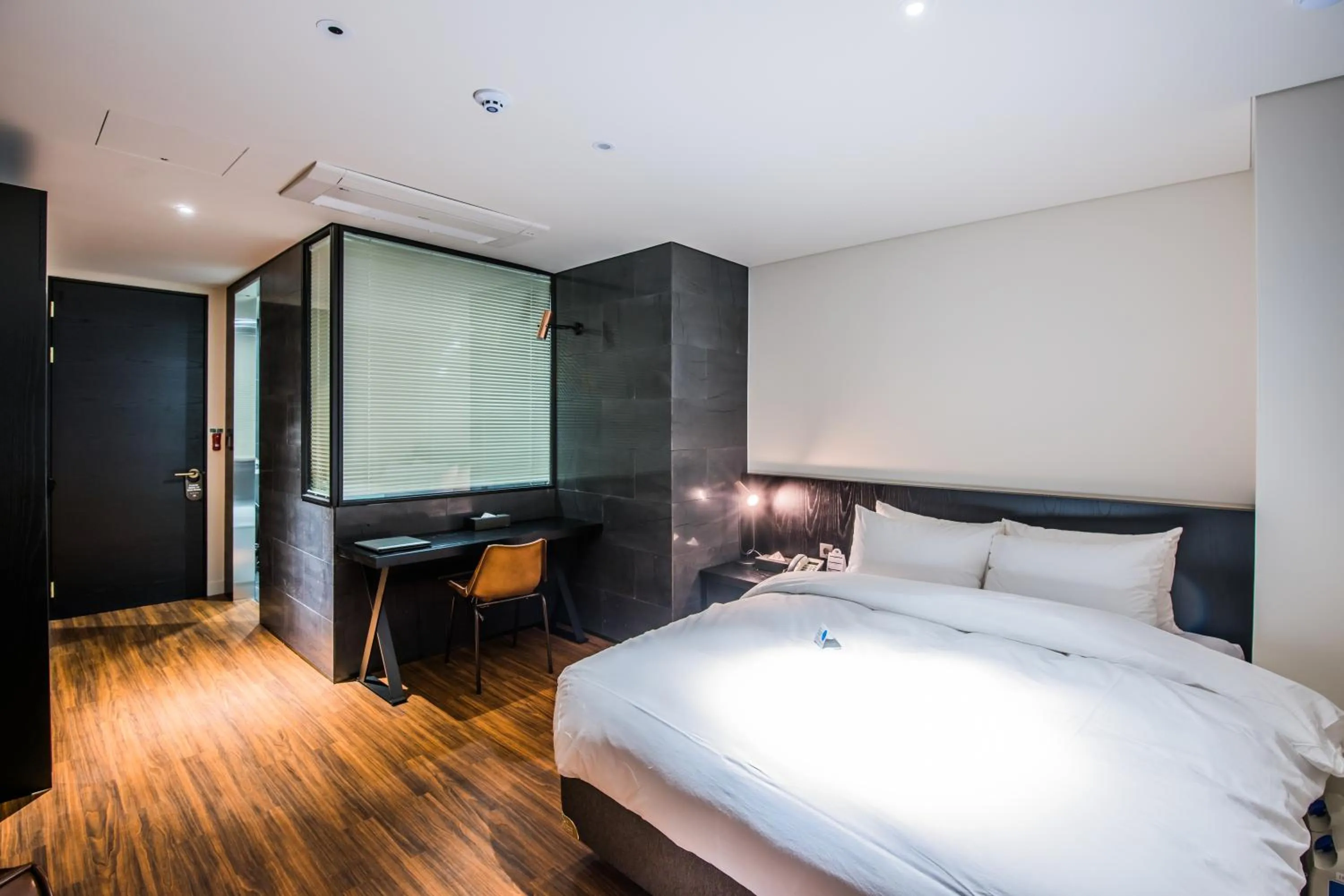 Bed in Rivertain Hotel