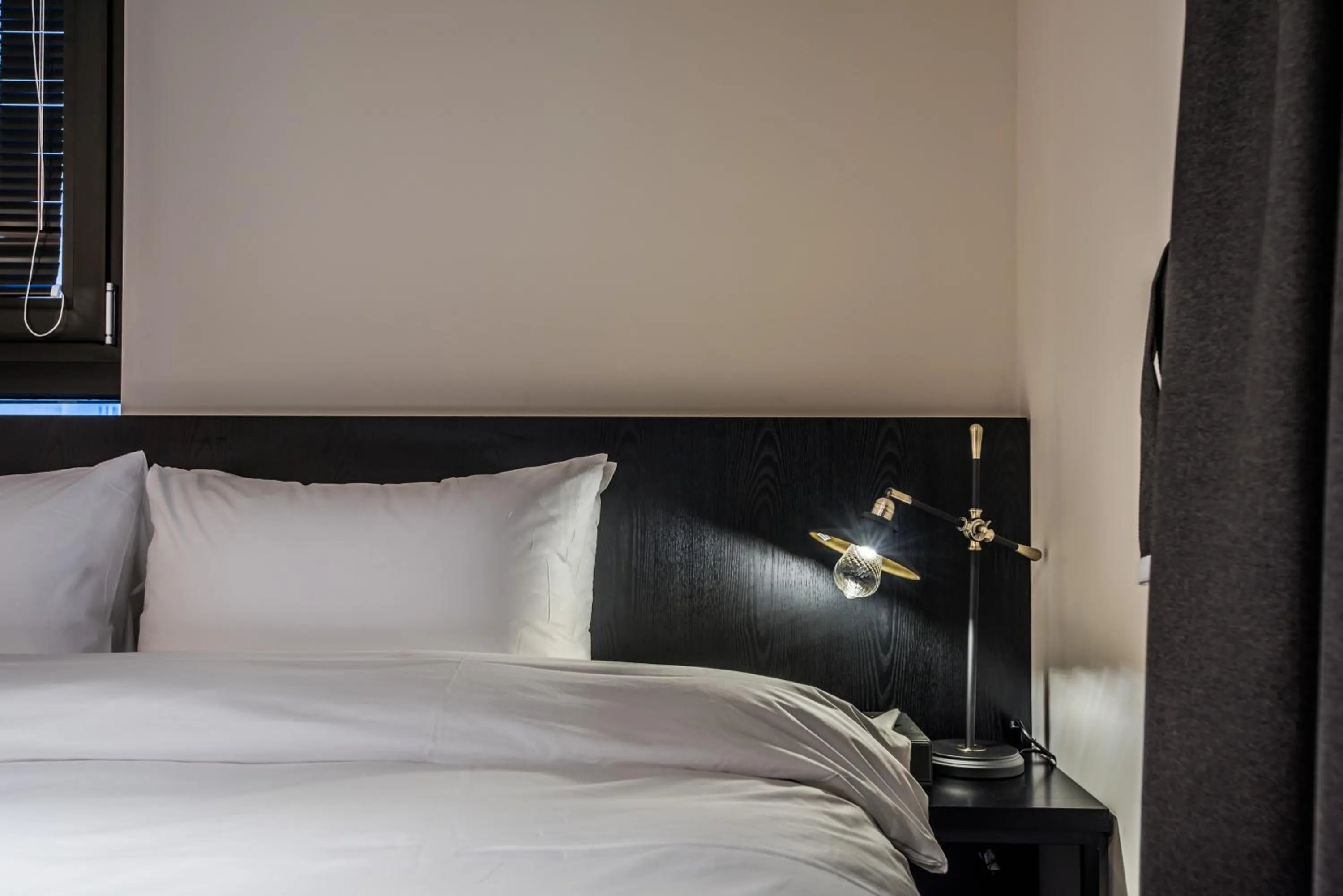 Bed in Rivertain Hotel