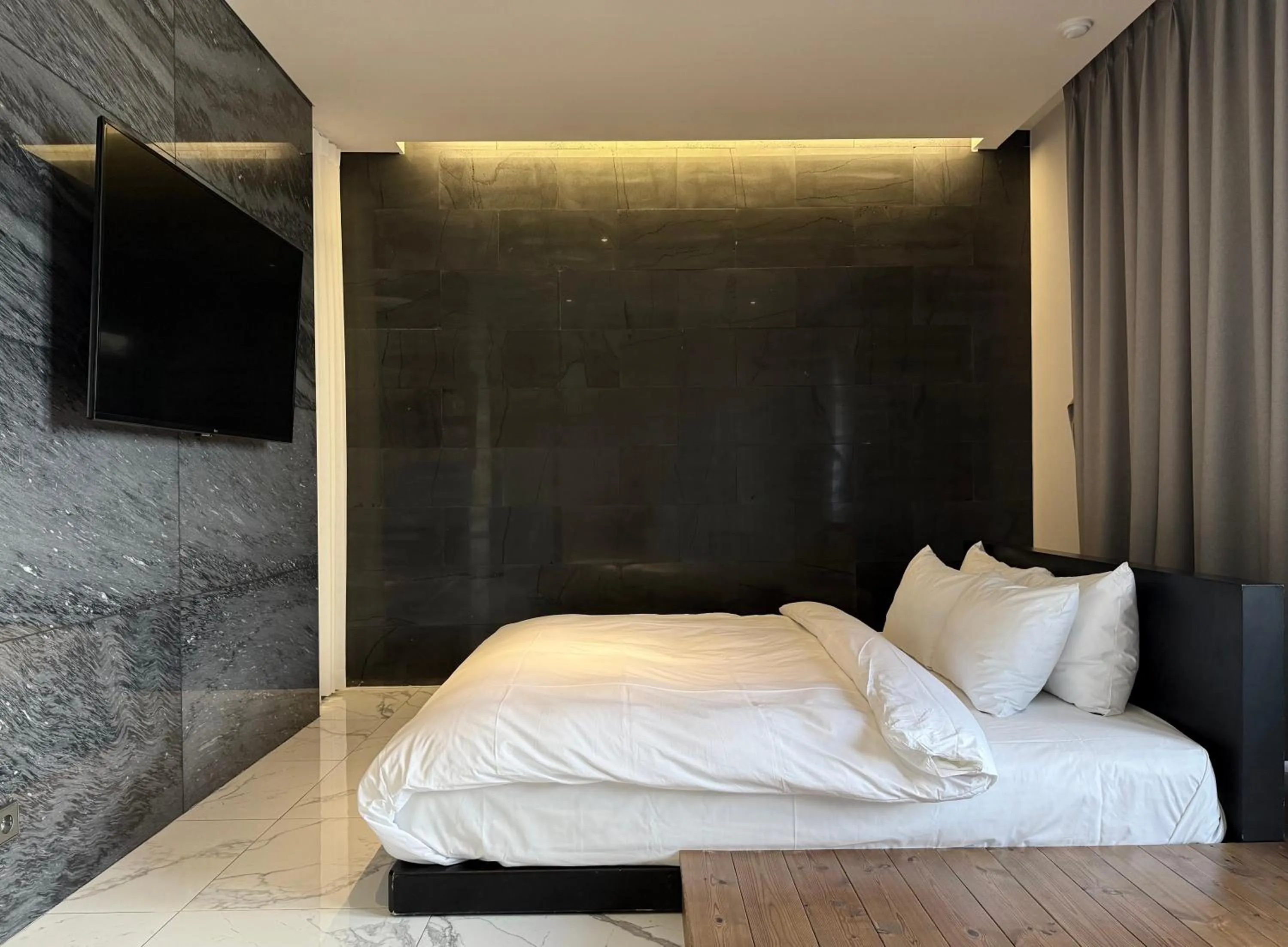 Bed in Rivertain Hotel