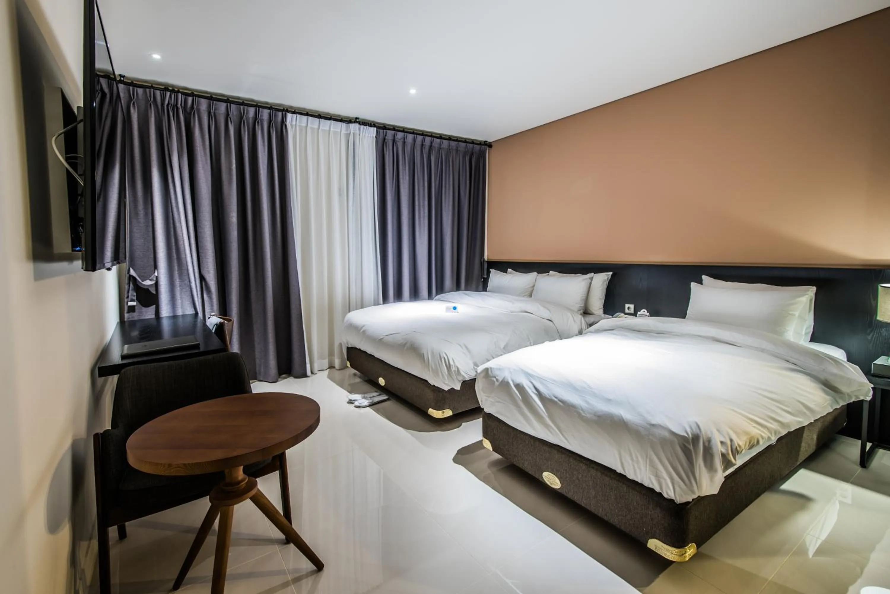 Bed in Rivertain Hotel