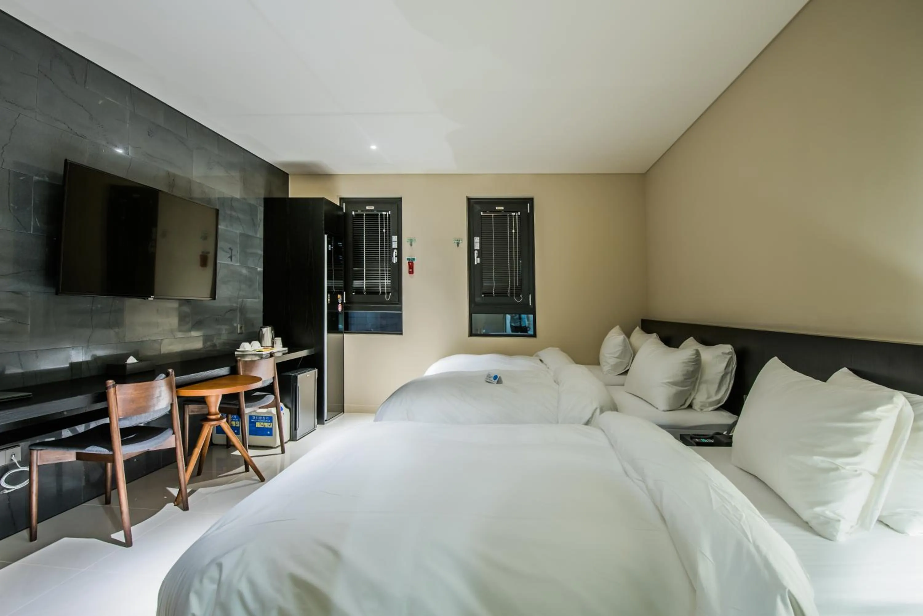 Bed in Rivertain Hotel