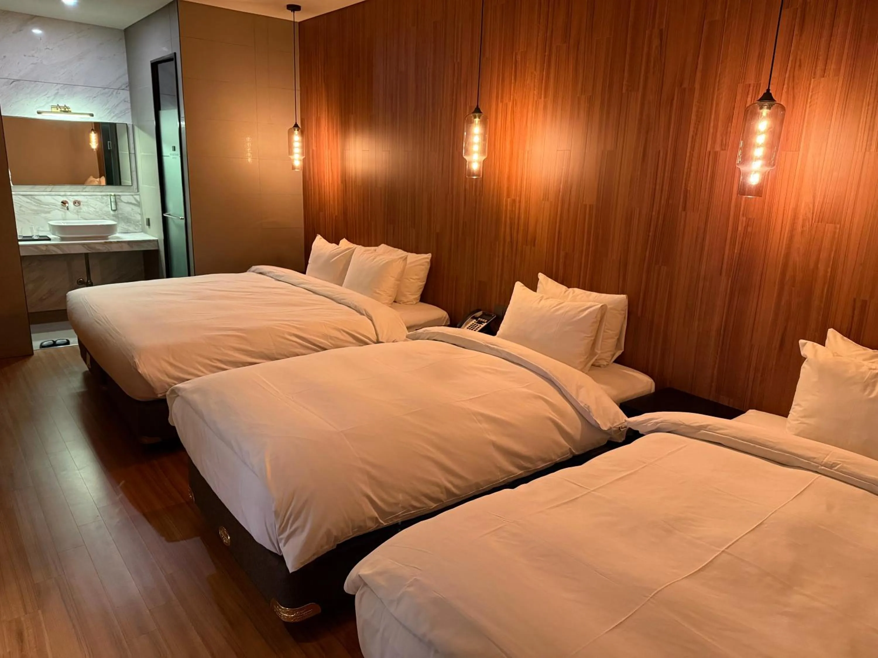 Bed in Rivertain Hotel