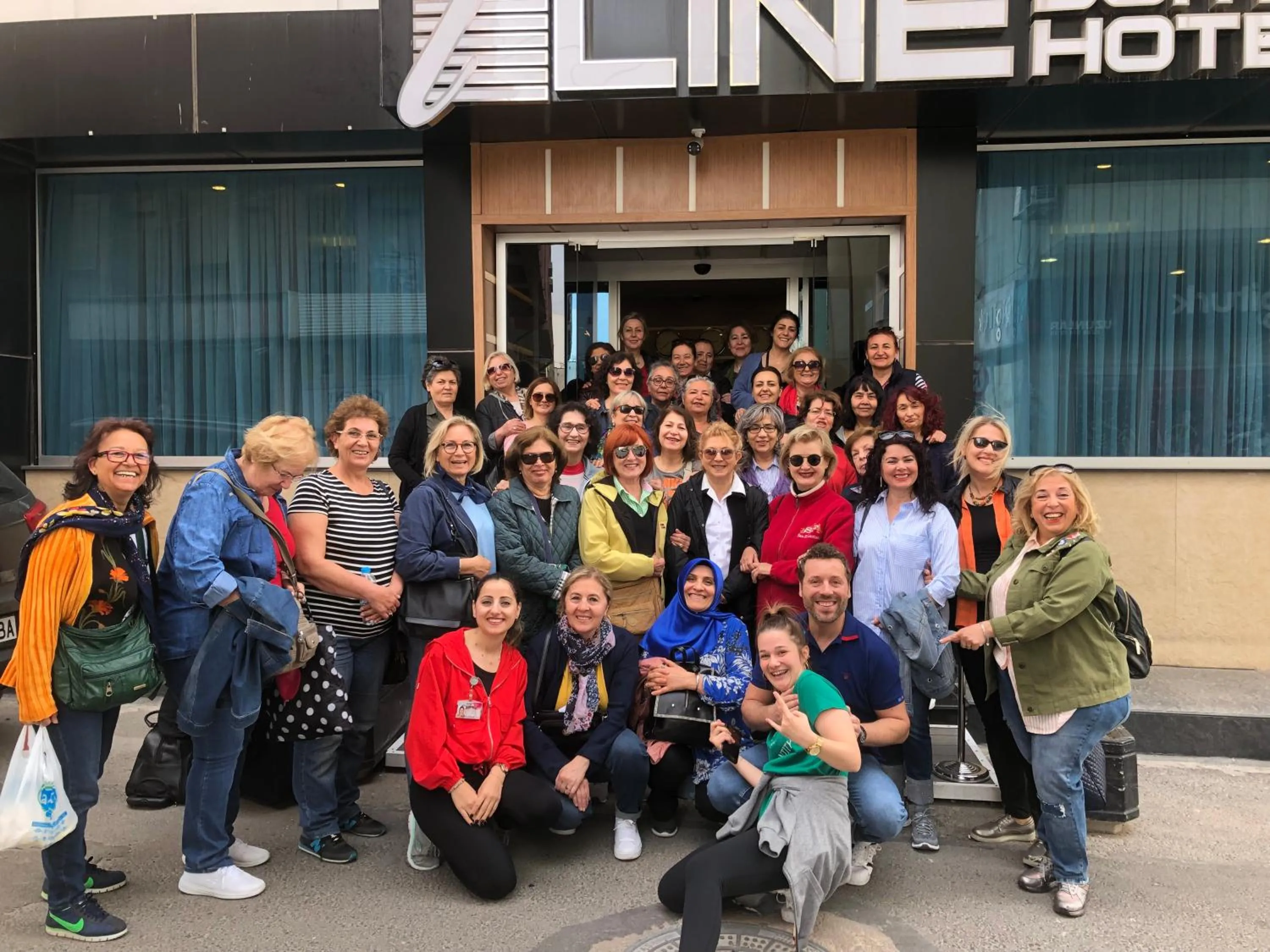 People in Line Suite Hotel