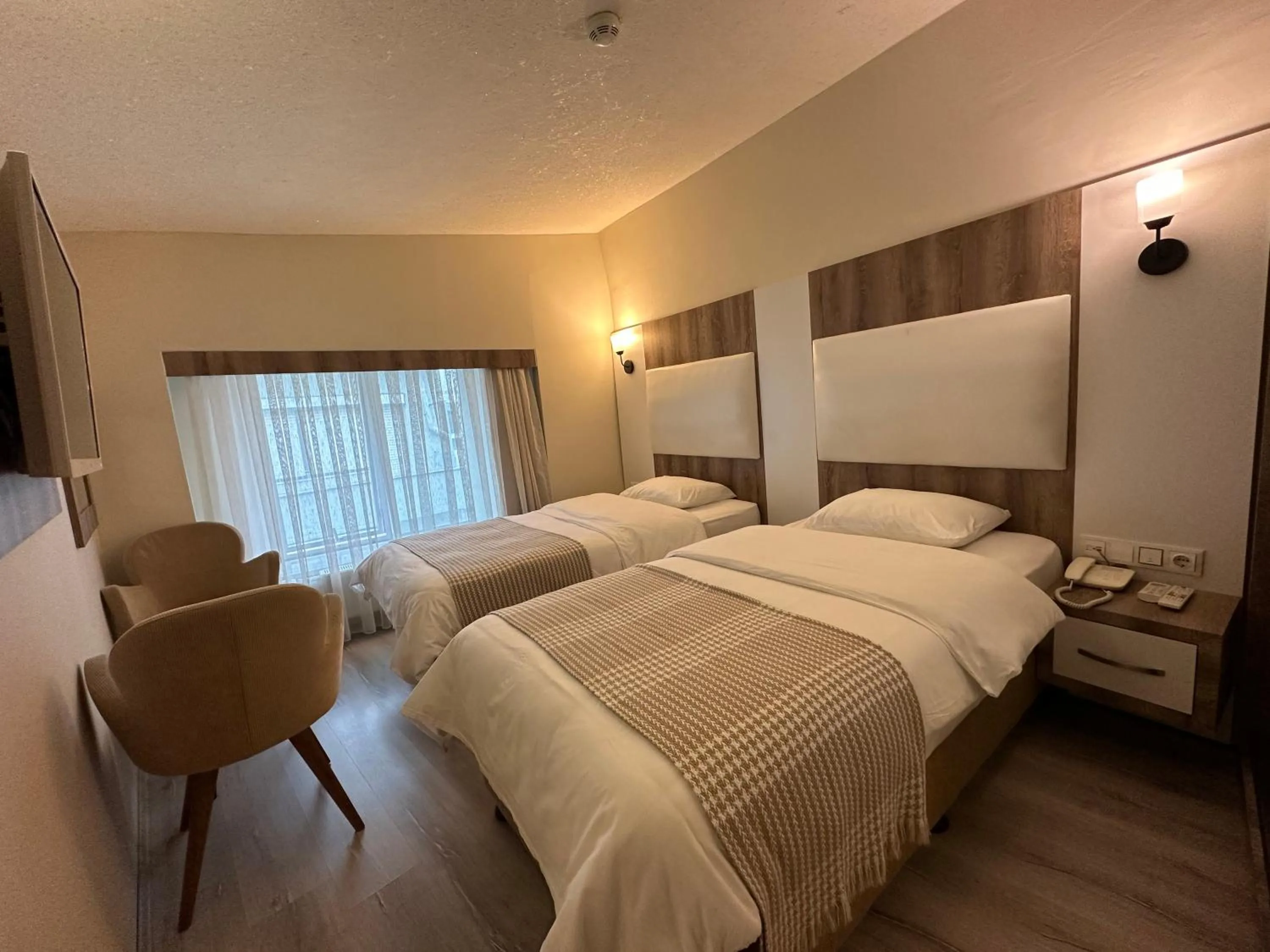 Bed in Line Suite Hotel