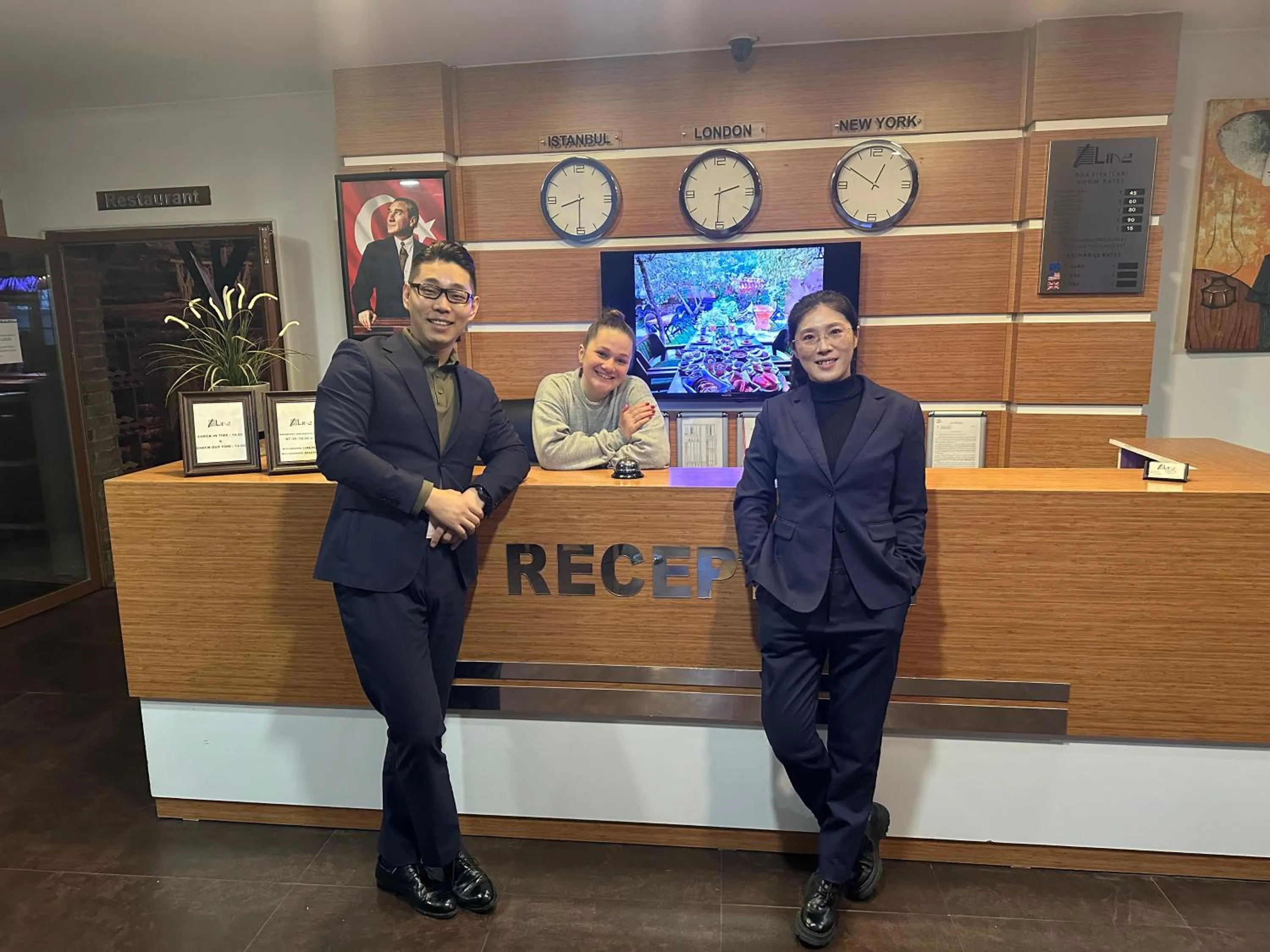 Staff in Line Suite Hotel