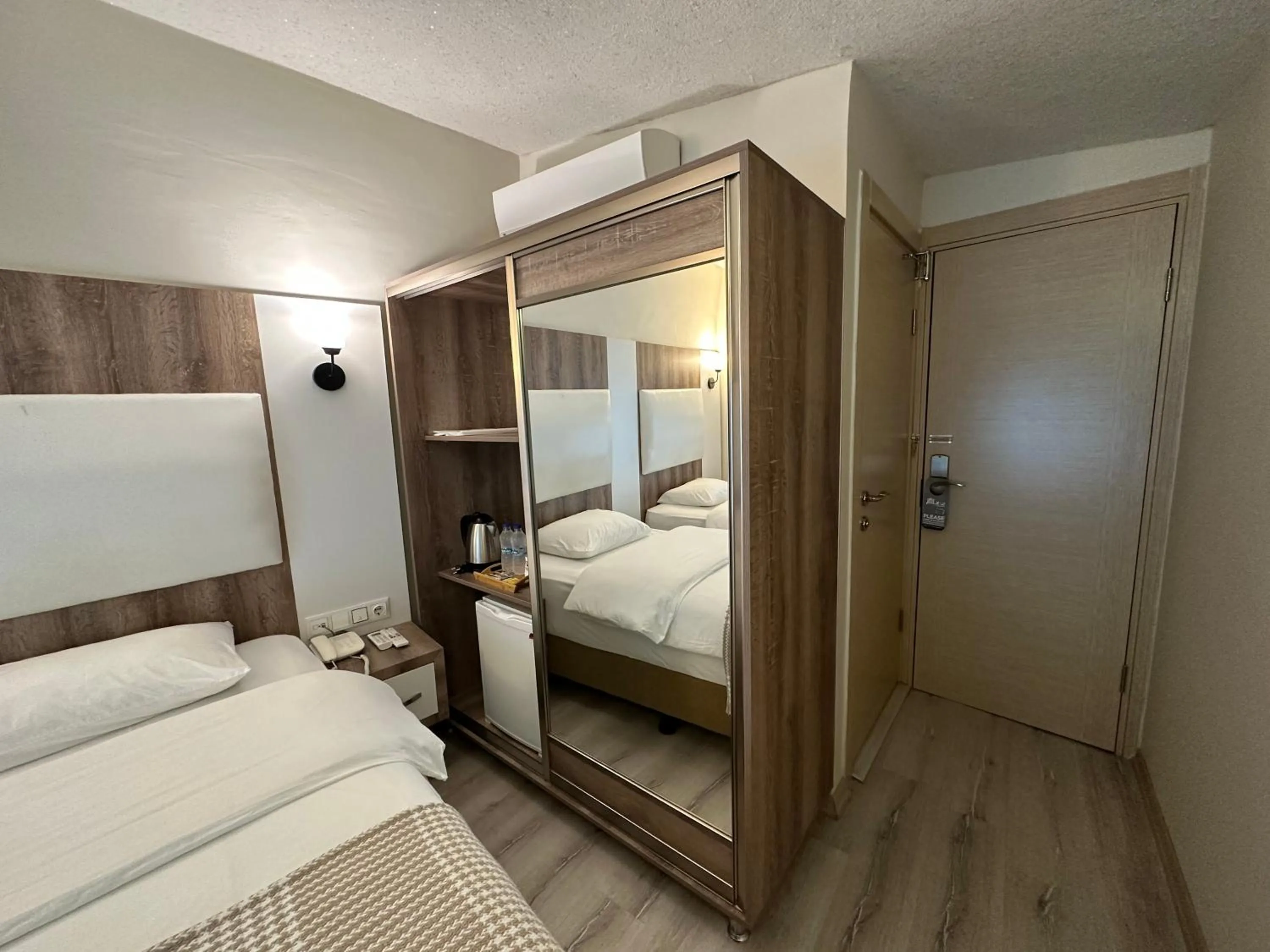 Bed in Line Suite Hotel