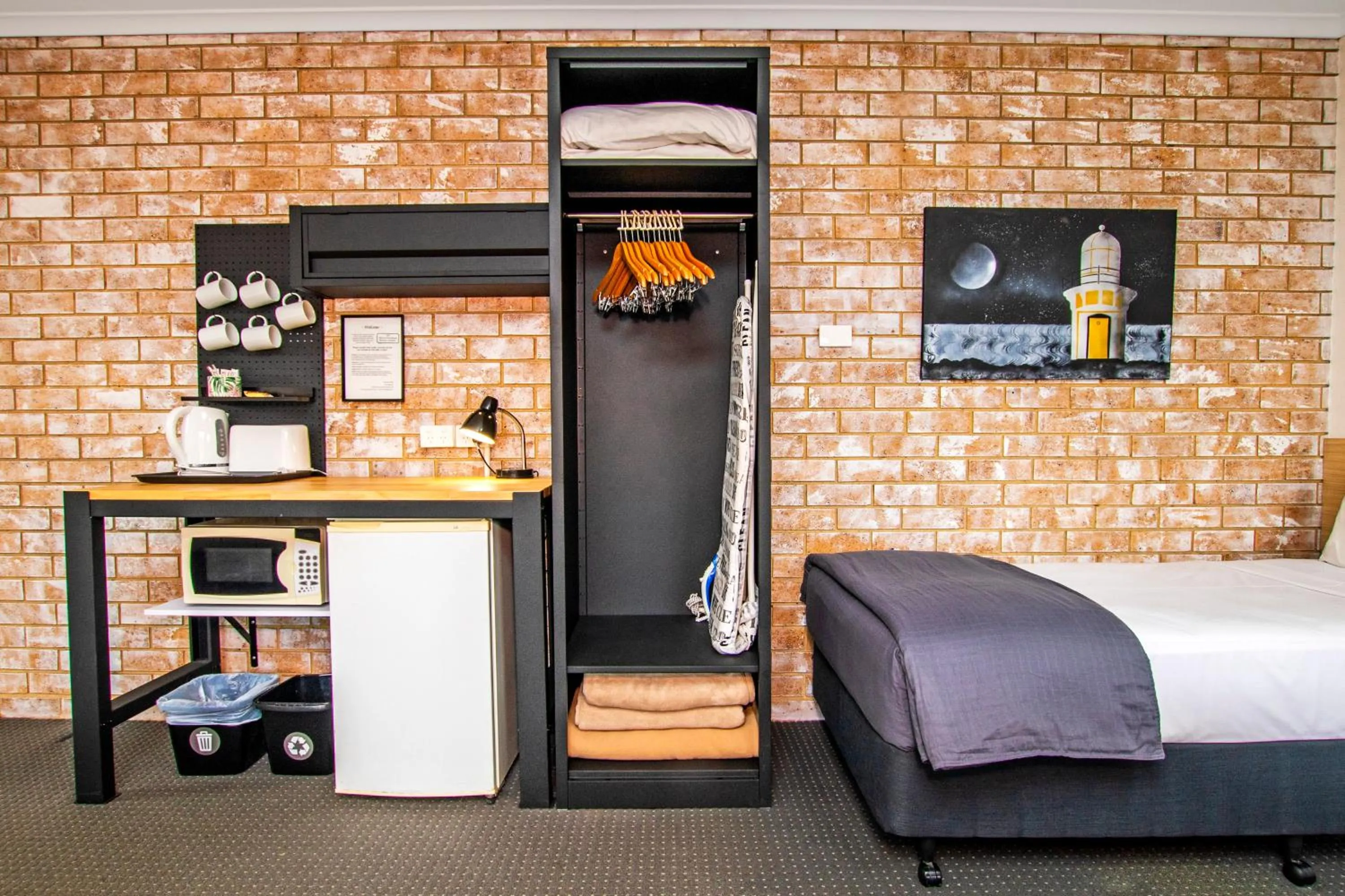 Bed in River Street Motel