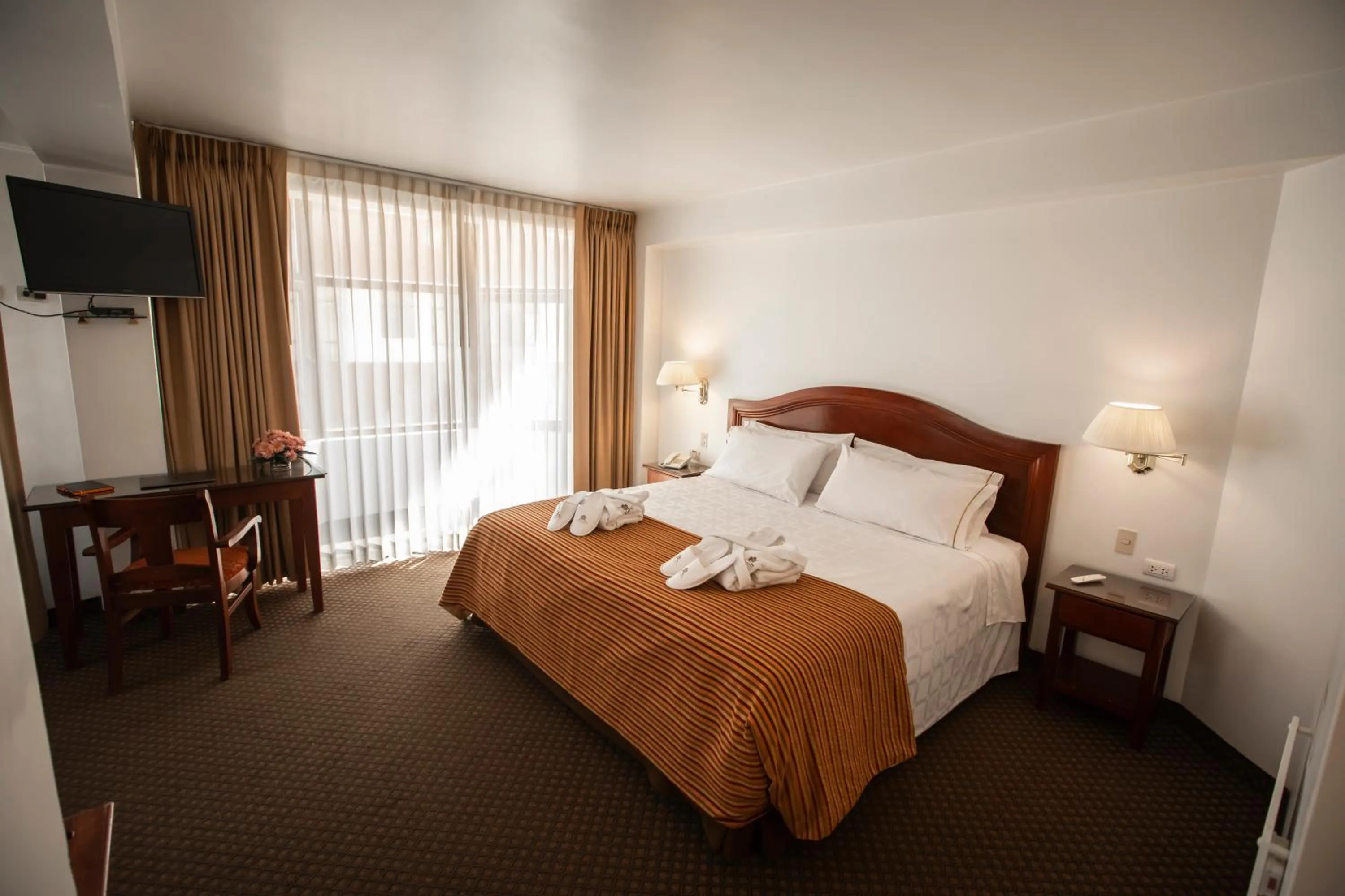 Photo of the whole room, Bed in Hotel Hacienda Puno Centro Histórico