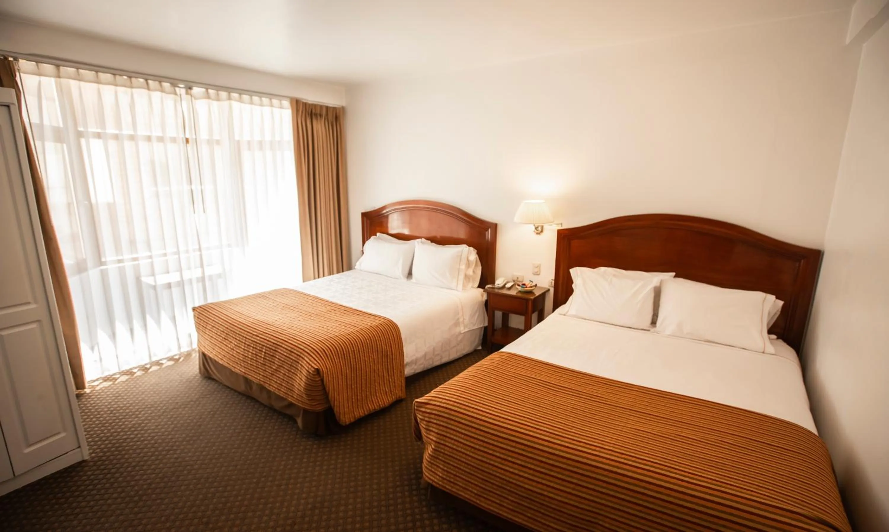 Photo of the whole room, Bed in Hotel Hacienda Puno Centro Histórico