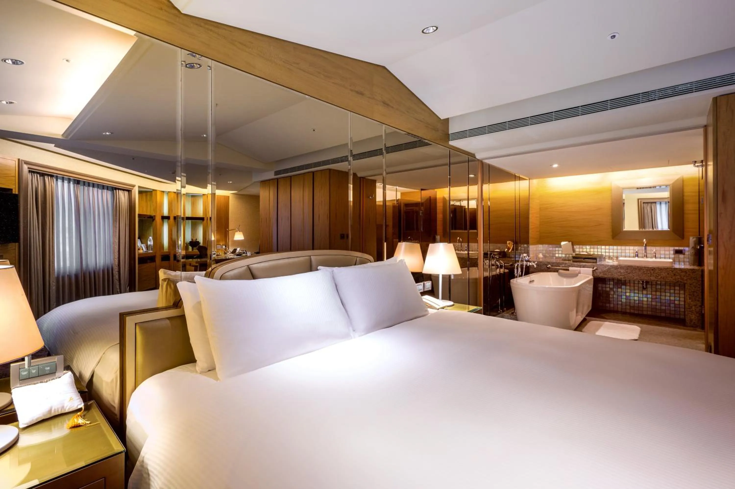 Bed in The Landis Taipei