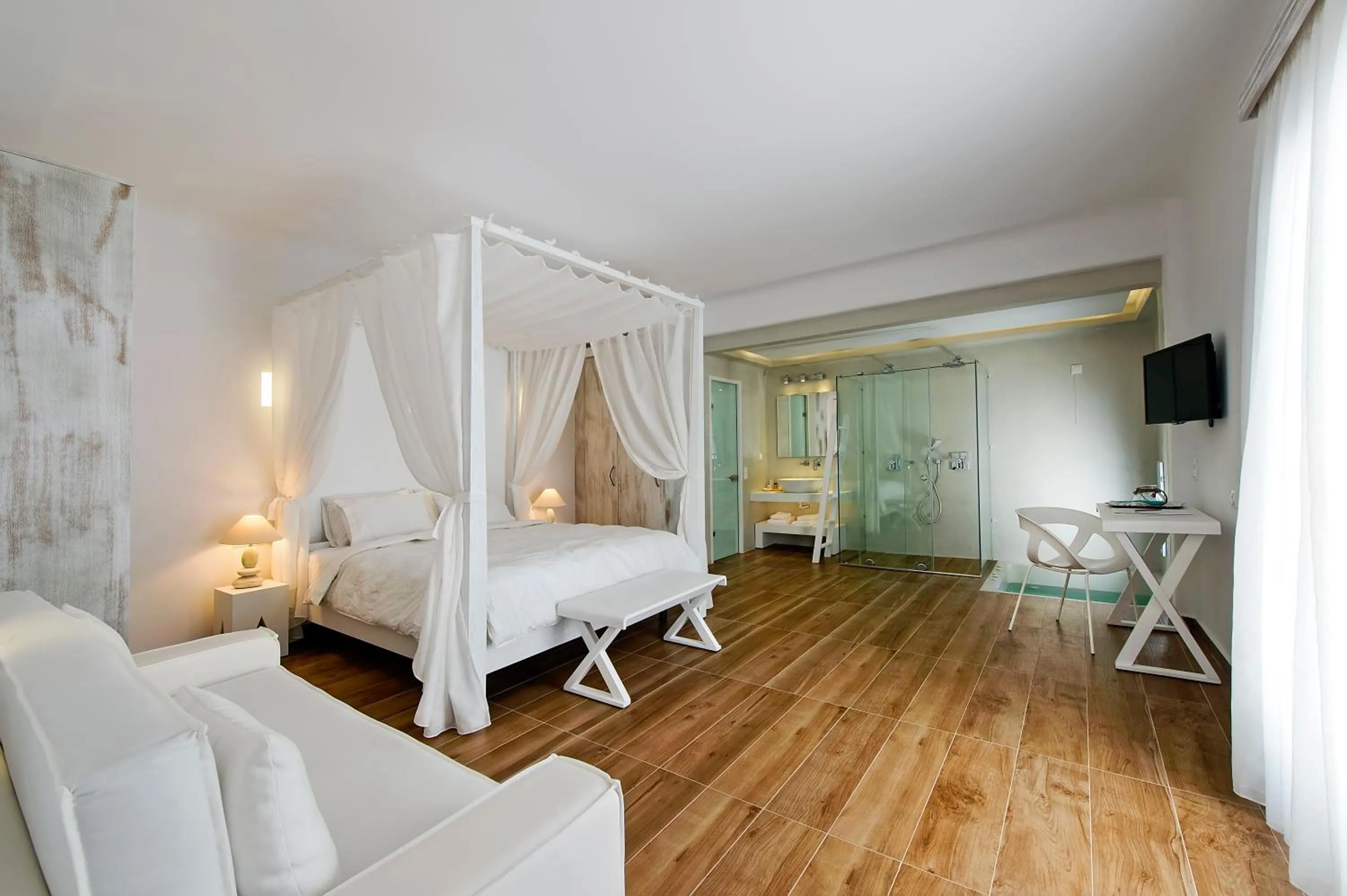 Photo of the whole room, Bed in Cavo Bianco Boutique Hotel & Spa