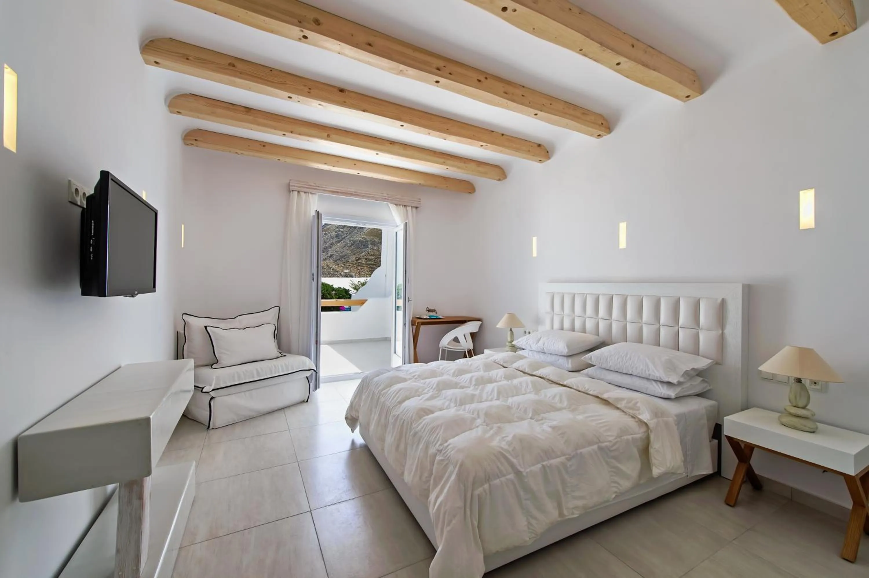 Bed in Cavo Bianco Boutique Hotel & Spa