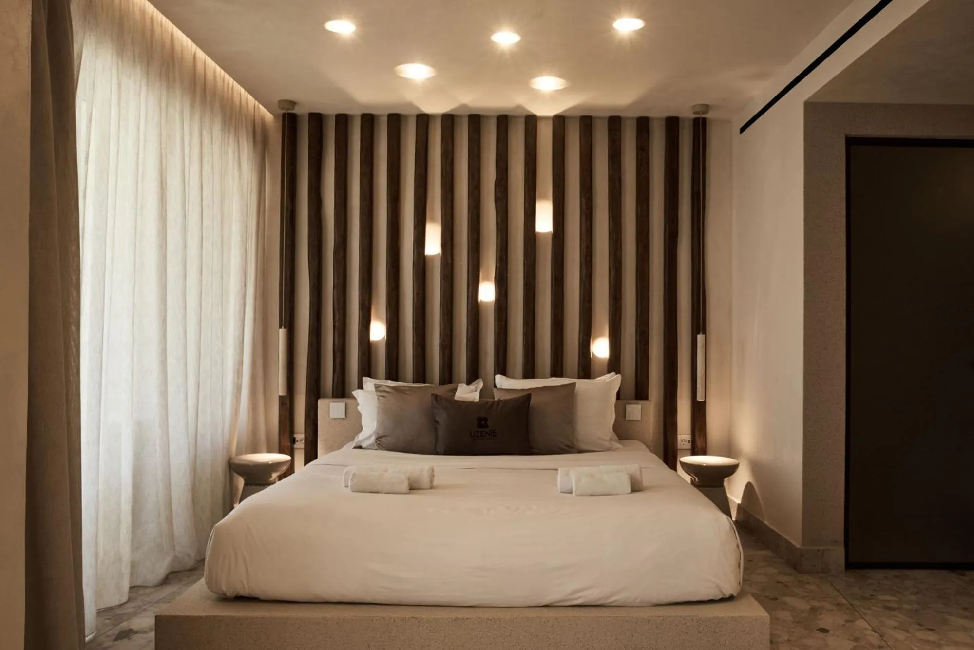 Bed in Uzenie All Suites Boutique Resort