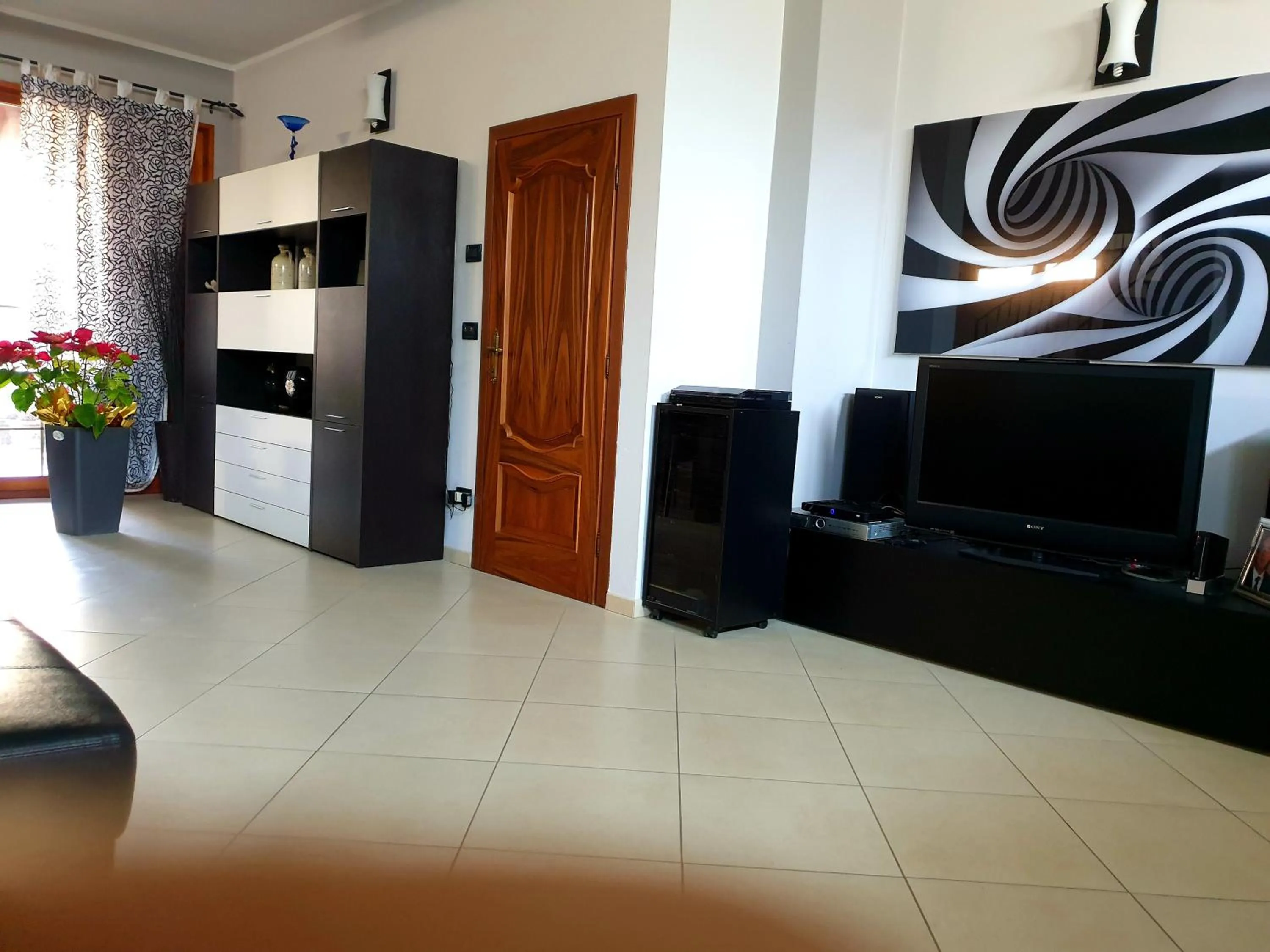 Communal lounge/ TV room in B&B ENSILEVA BEACH