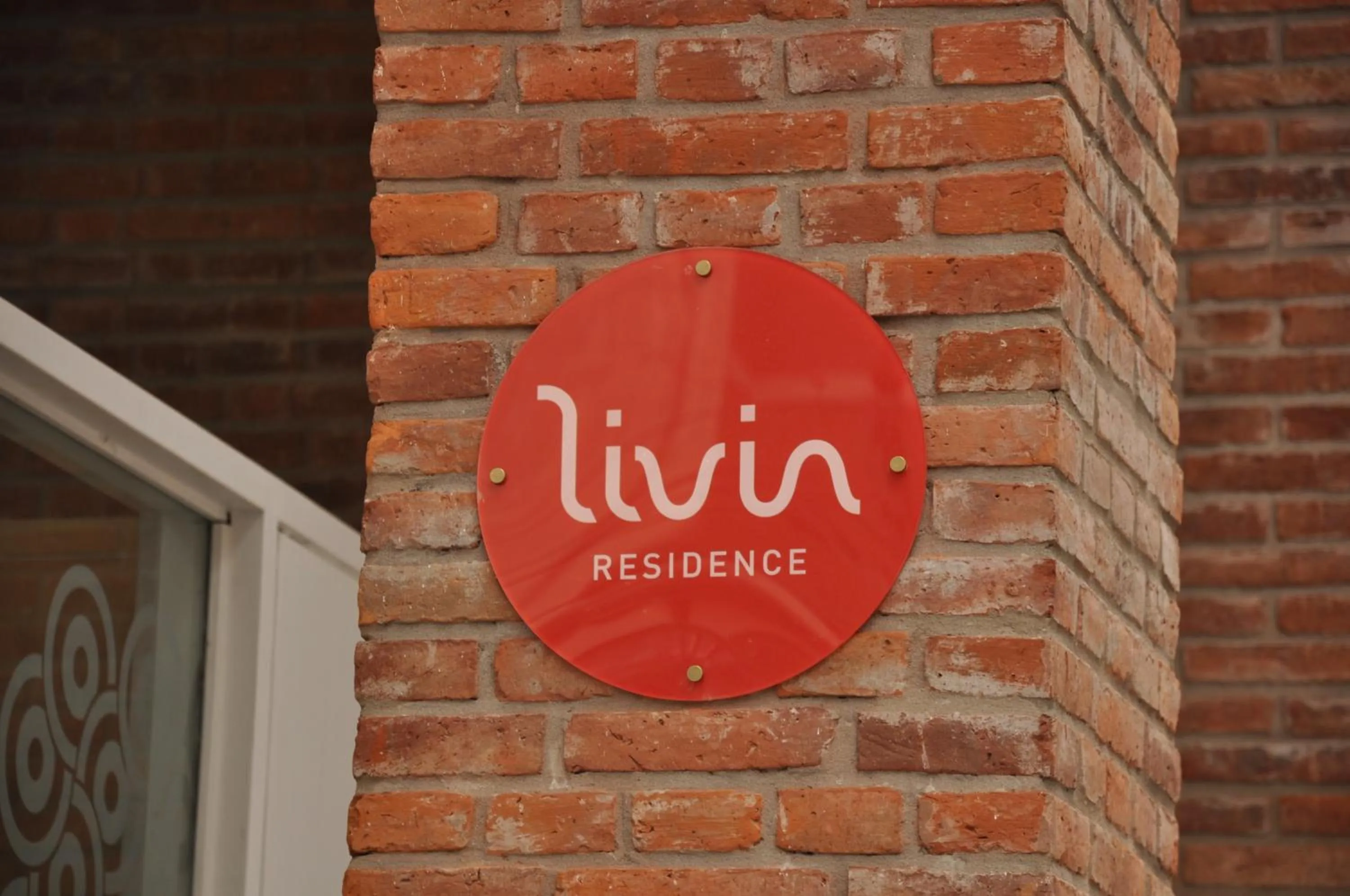 Property logo or sign in Livin' Residence Rosario