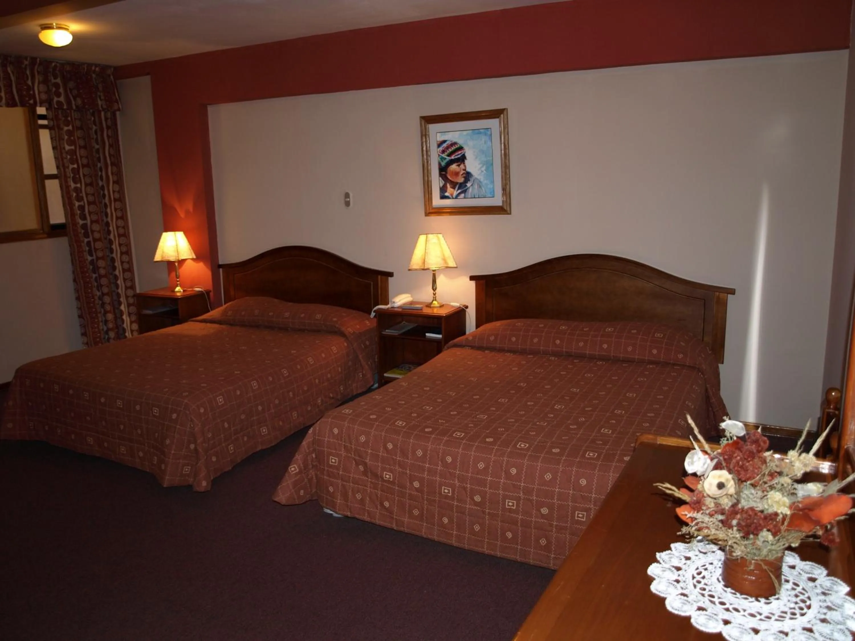 Bed in Qelqatani Hotel