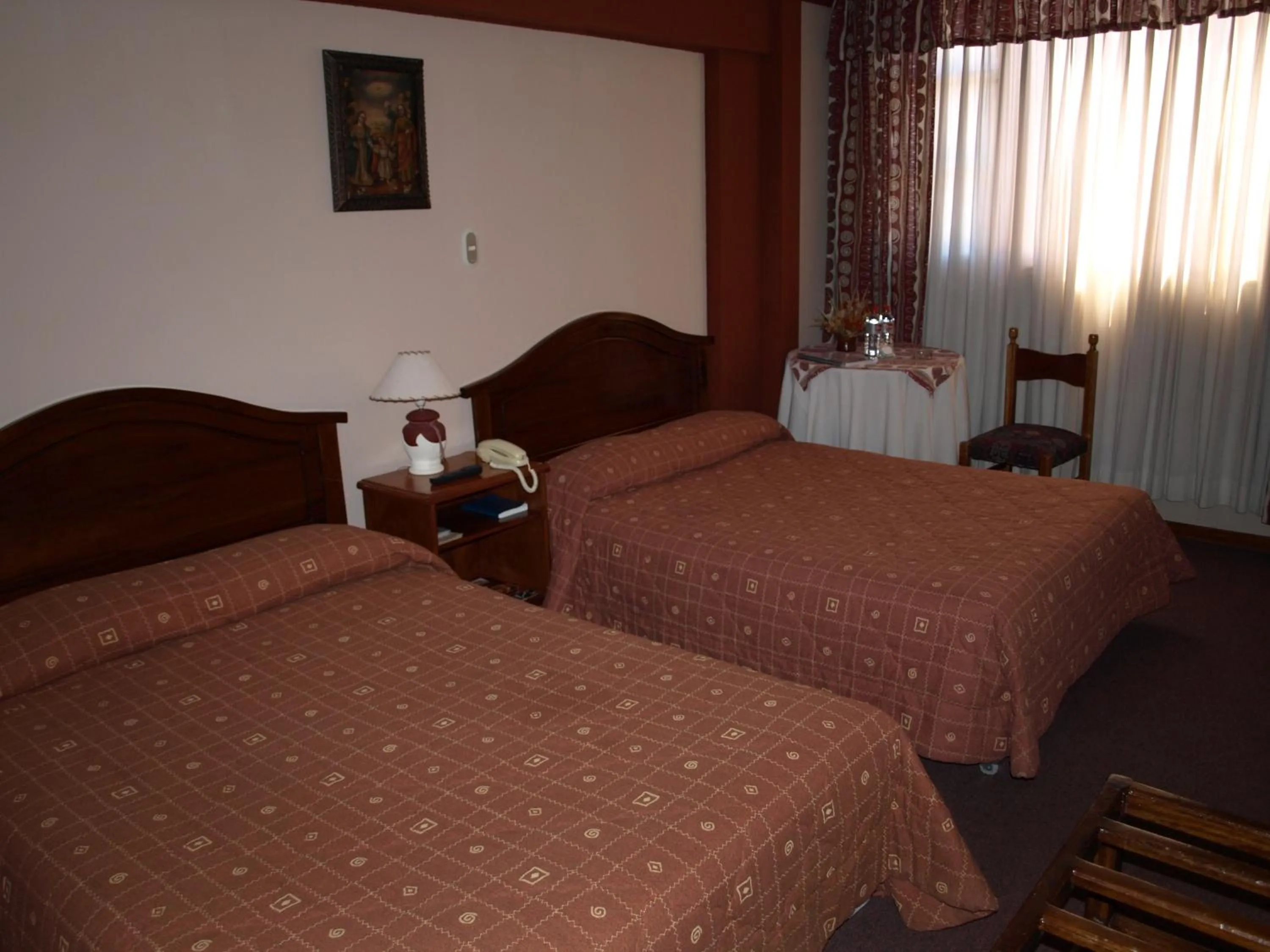 Bed in Qelqatani Hotel