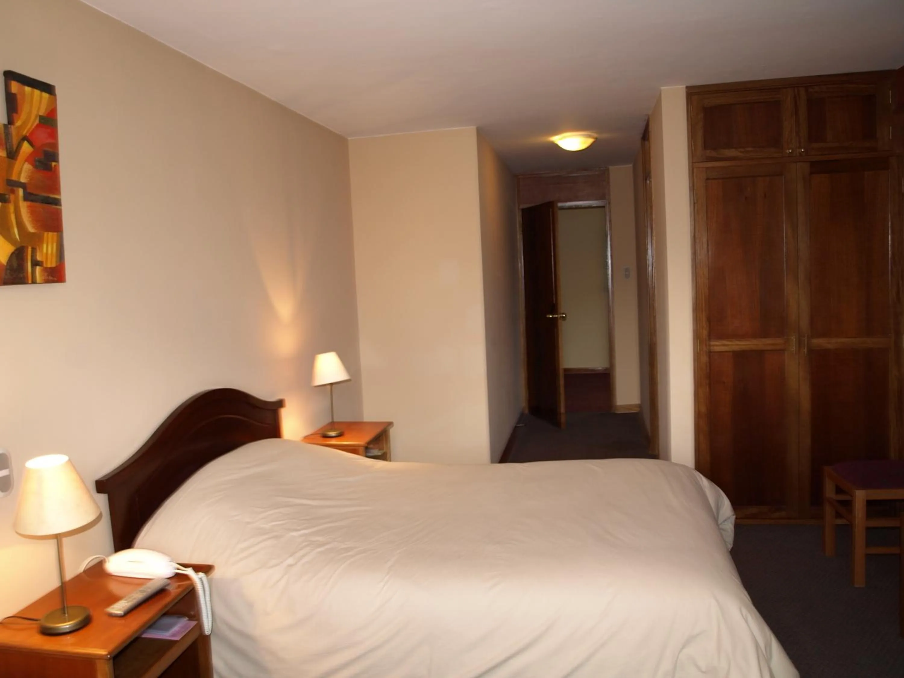 Bed in Qelqatani Hotel