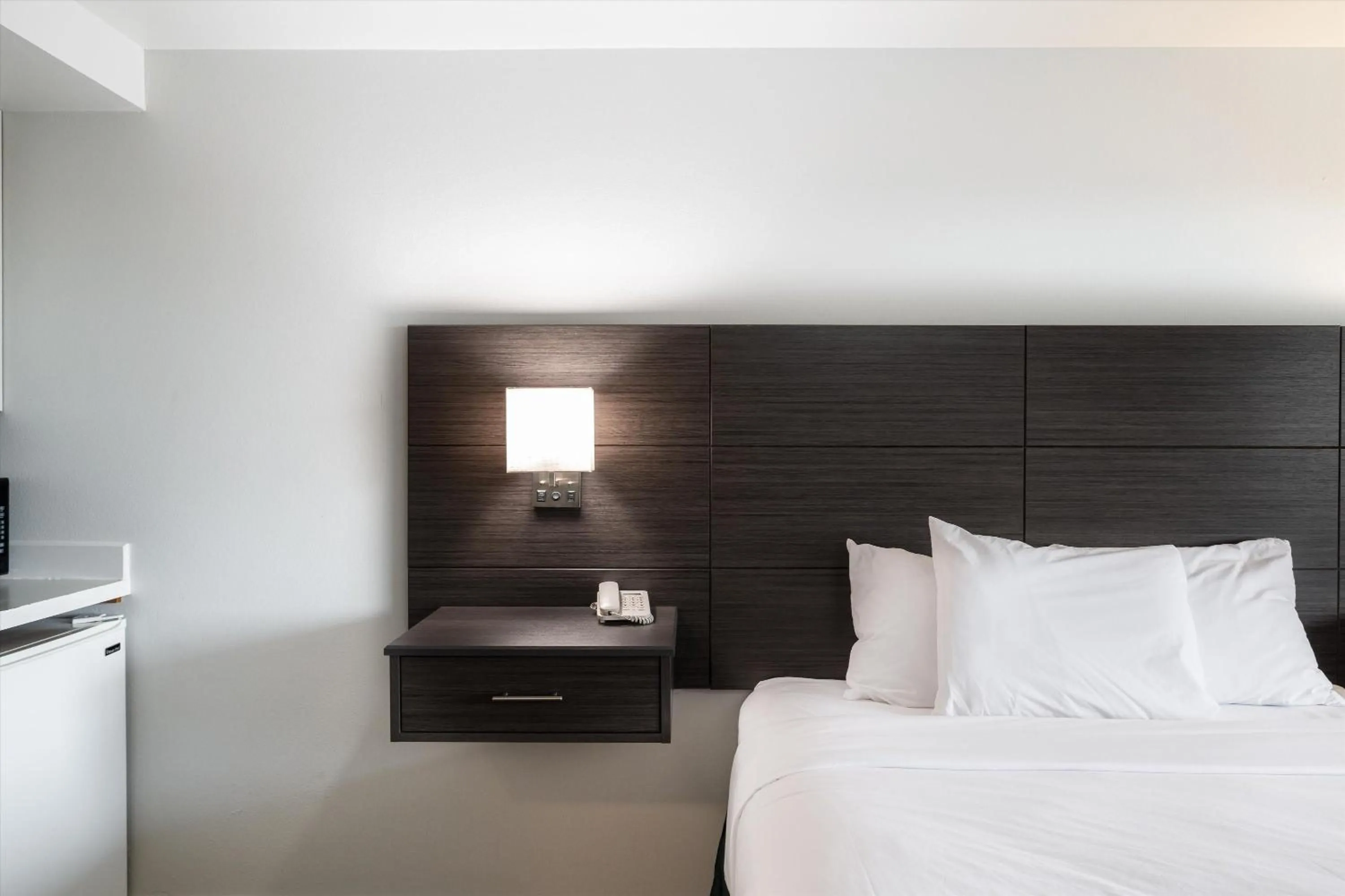 Bed in Baymont INN & Suites by Wyndham