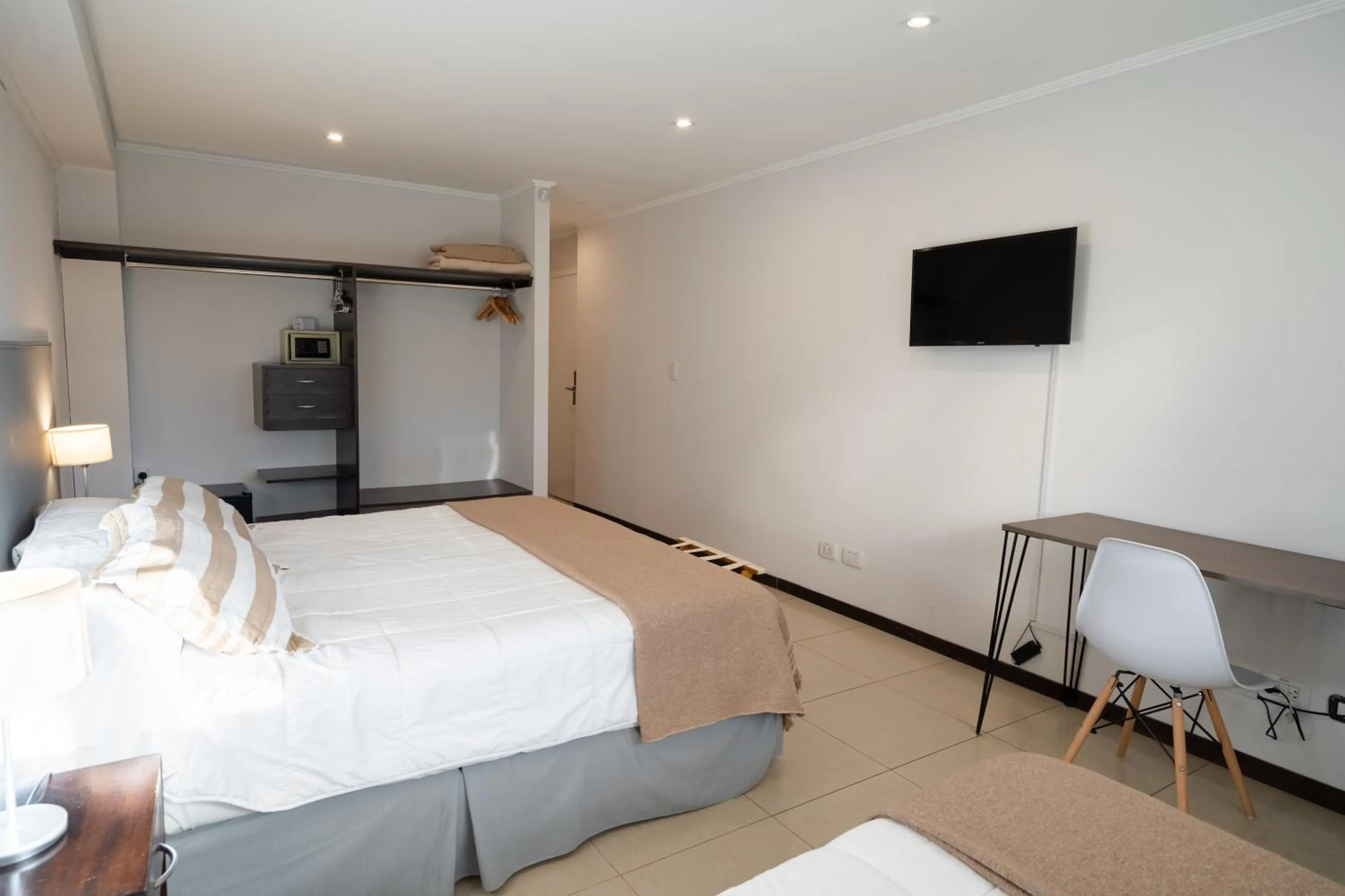 Bed in NBH Lacus Boutique Hotel