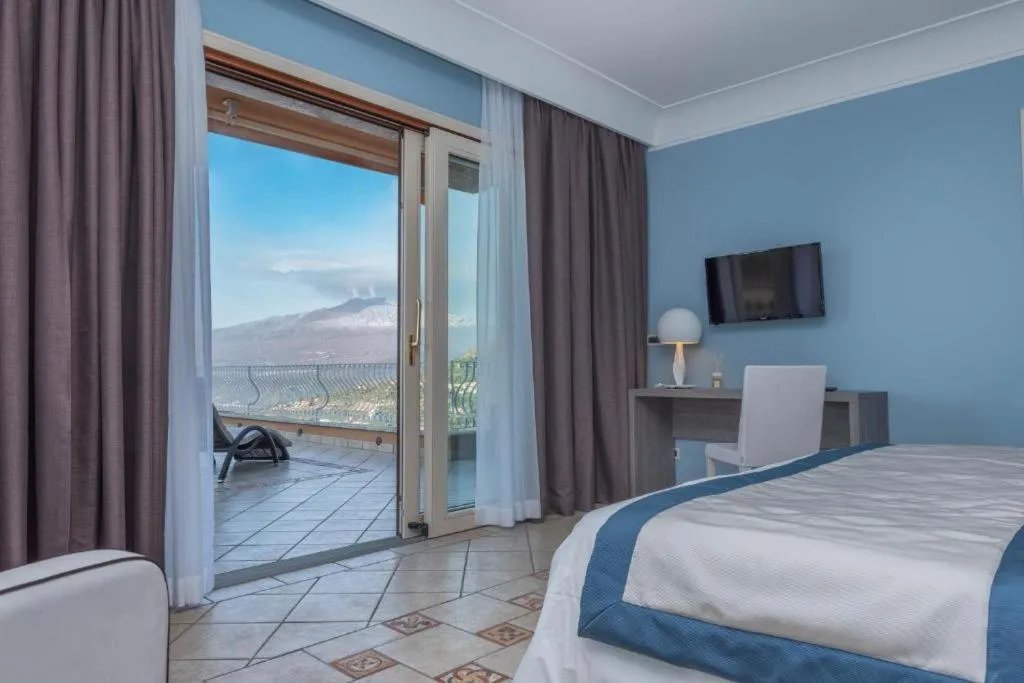 Bed in Villa Le Terrazze Charming Rooms