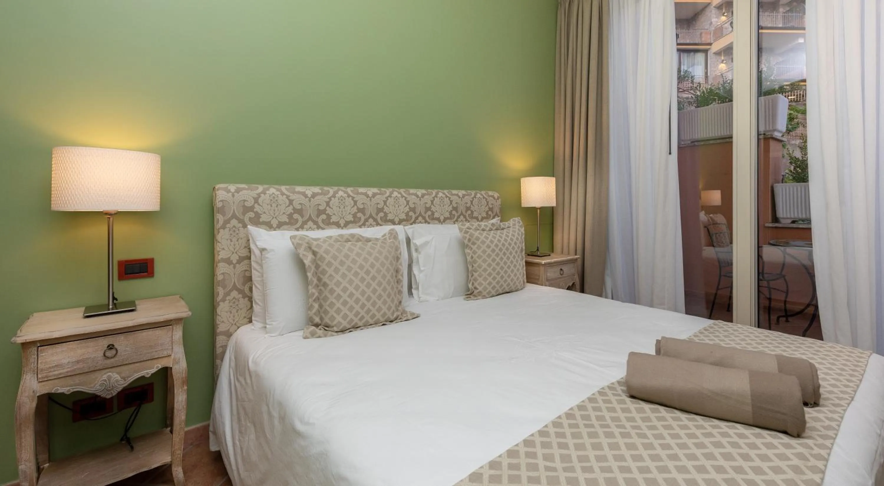 Bed in Villa Le Terrazze Charming Rooms