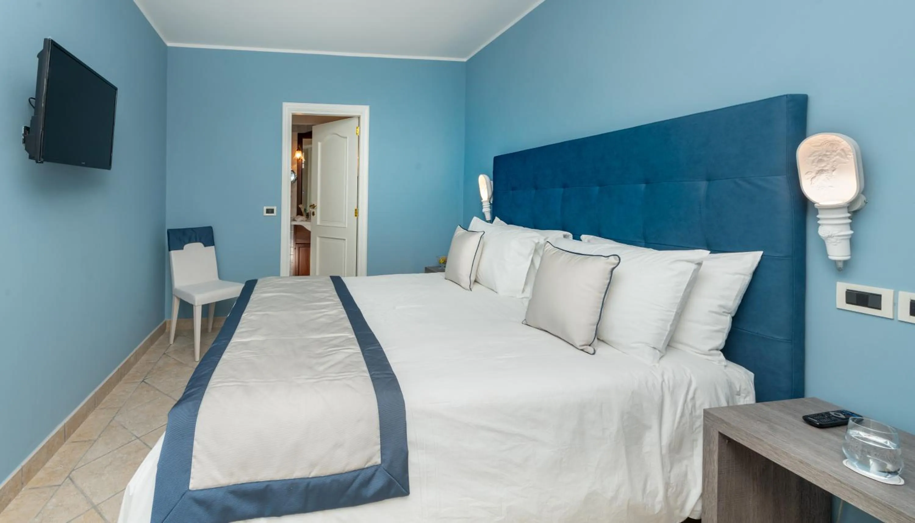 Bed in Villa Le Terrazze Charming Rooms