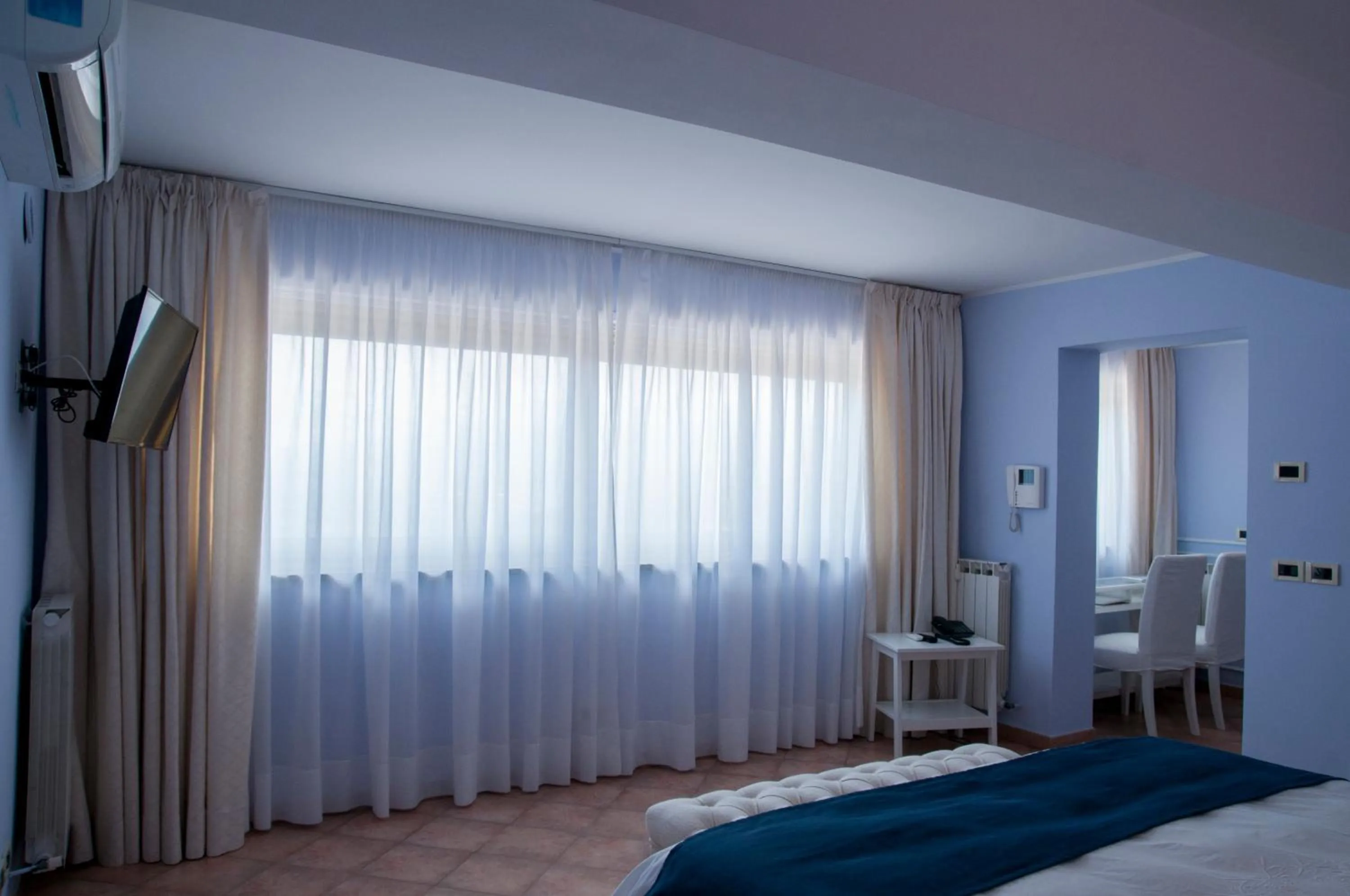 Bed in Villa Le Terrazze Charming Rooms