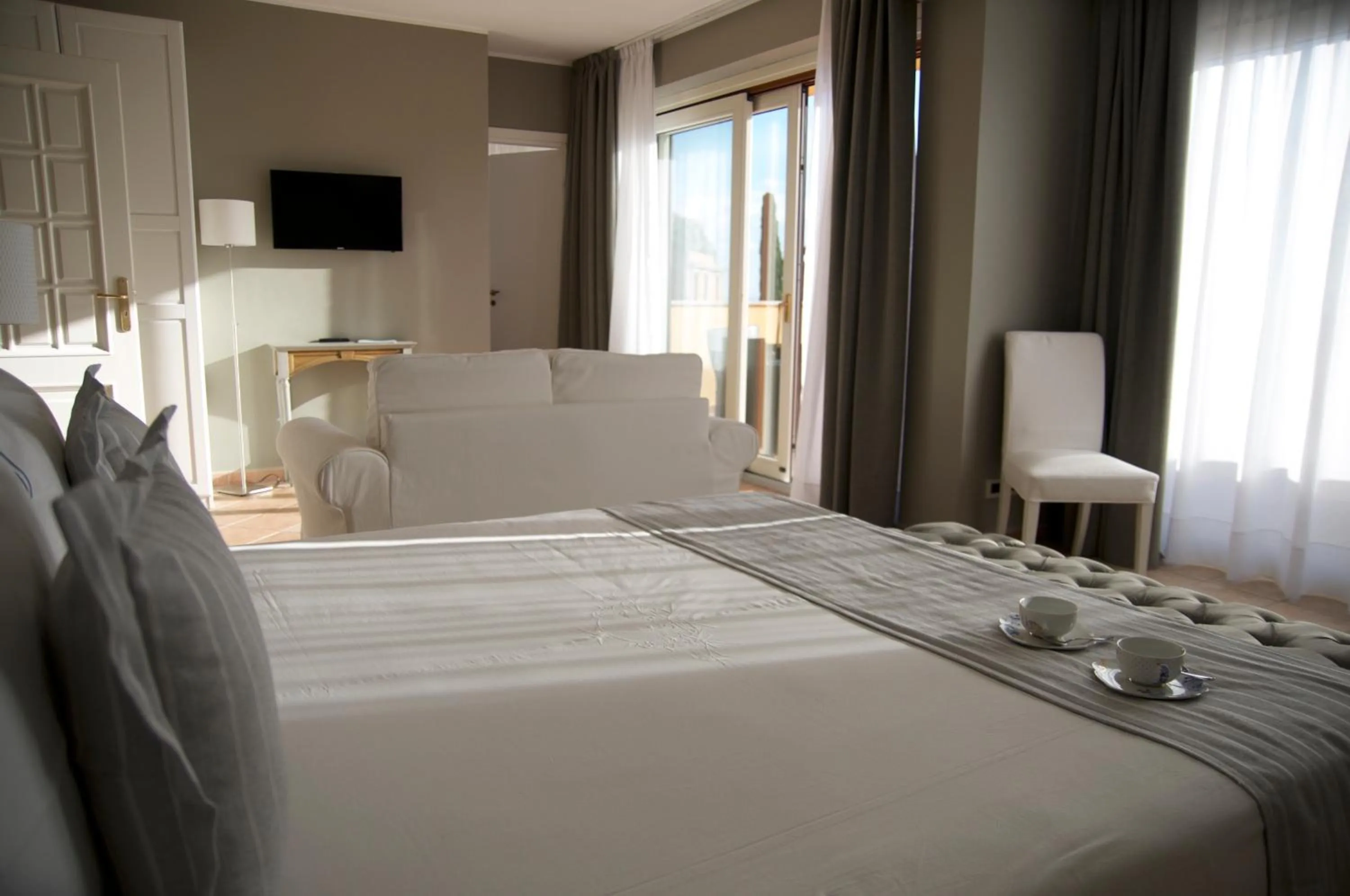 Bed in Villa Le Terrazze Charming Rooms