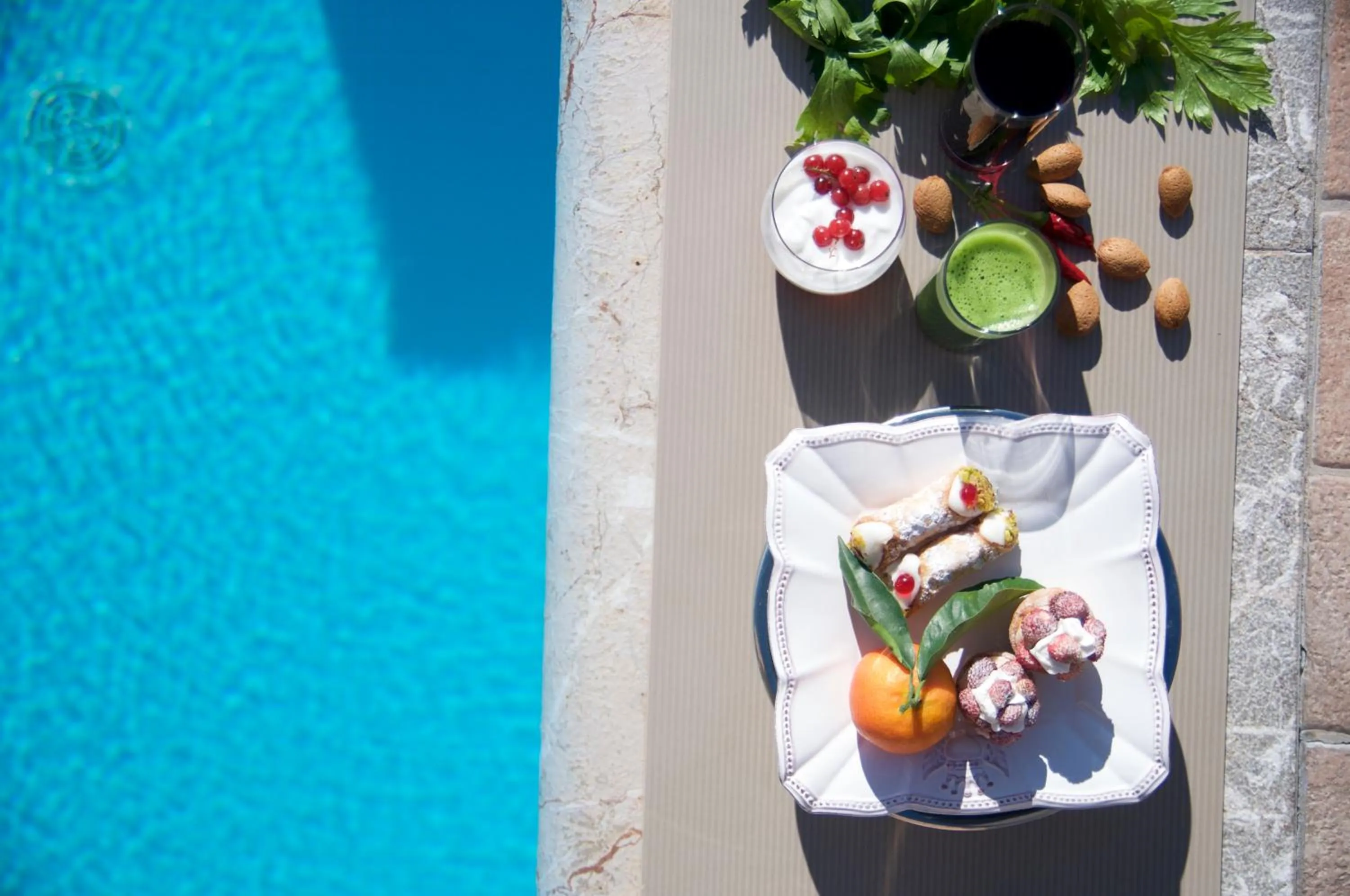 Swimming pool in Villa Le Terrazze Charming Rooms
