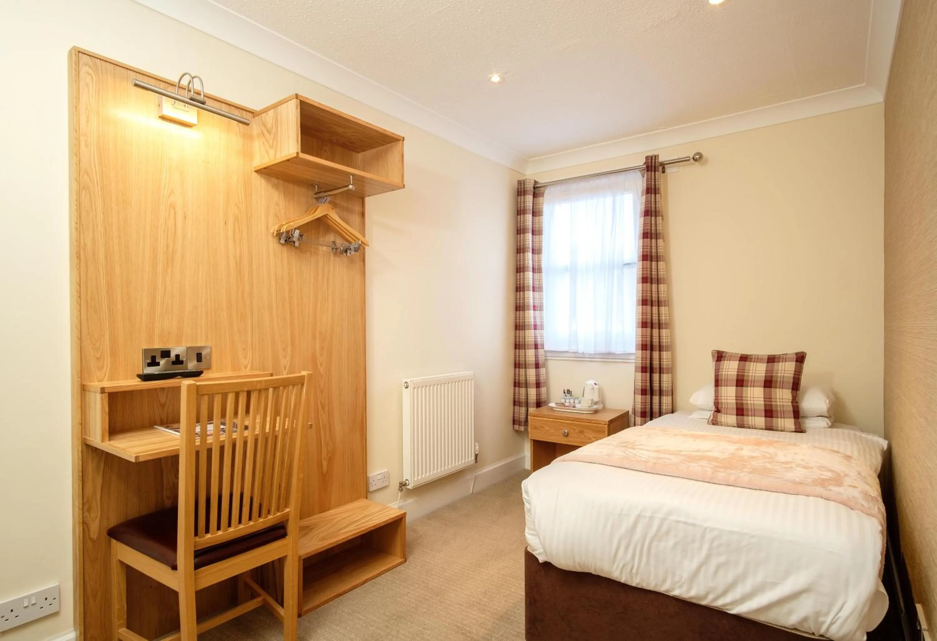 Bed in Adamson Hotel