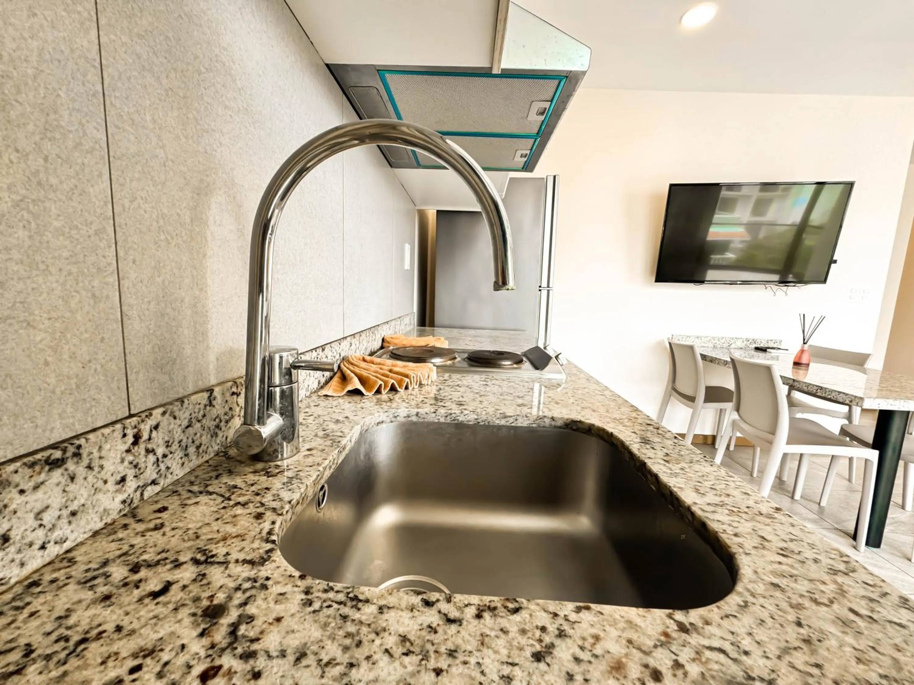 Kitchen or kitchenette in Grand Fifty Suites