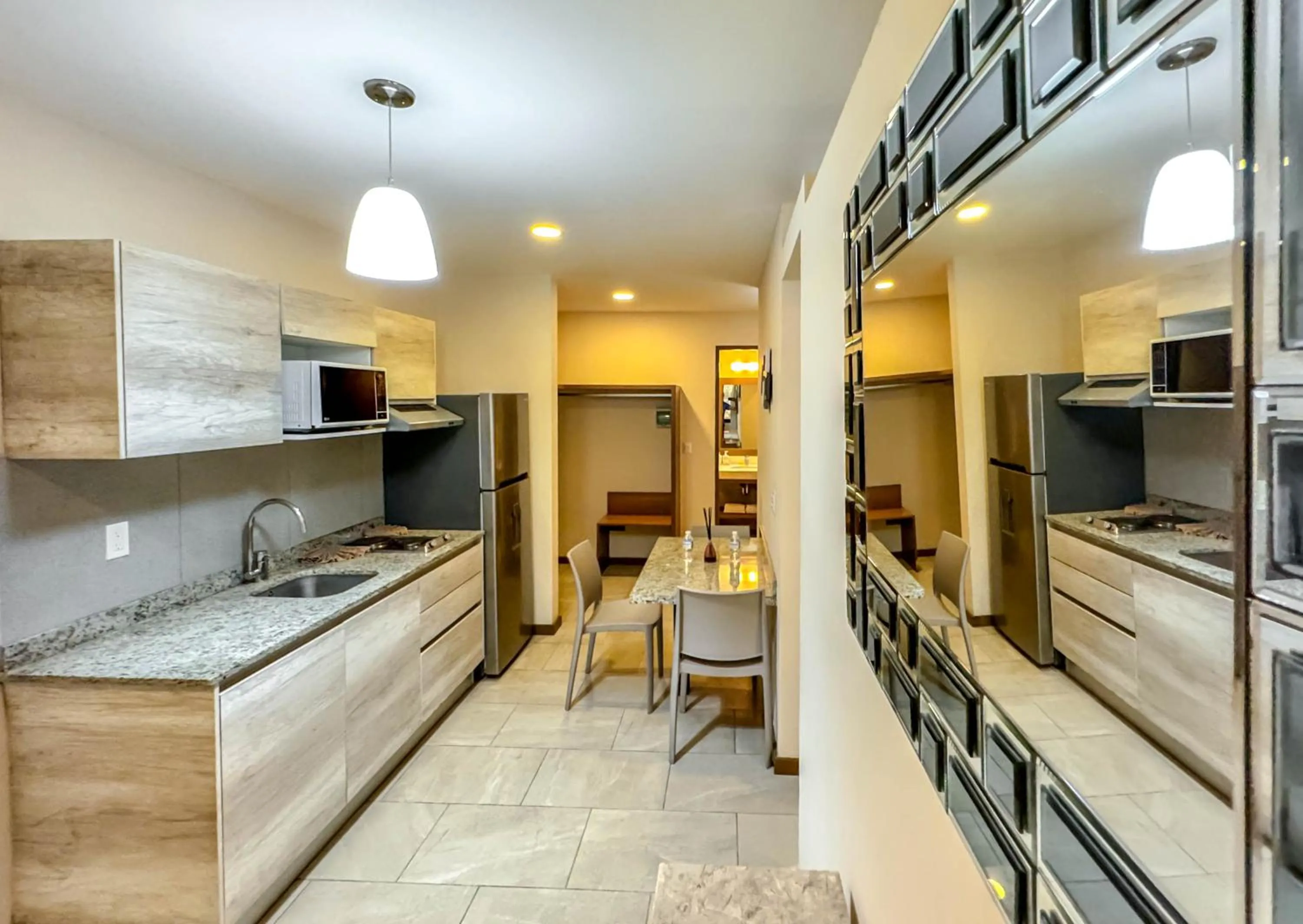Kitchen or kitchenette in Grand Fifty Suites