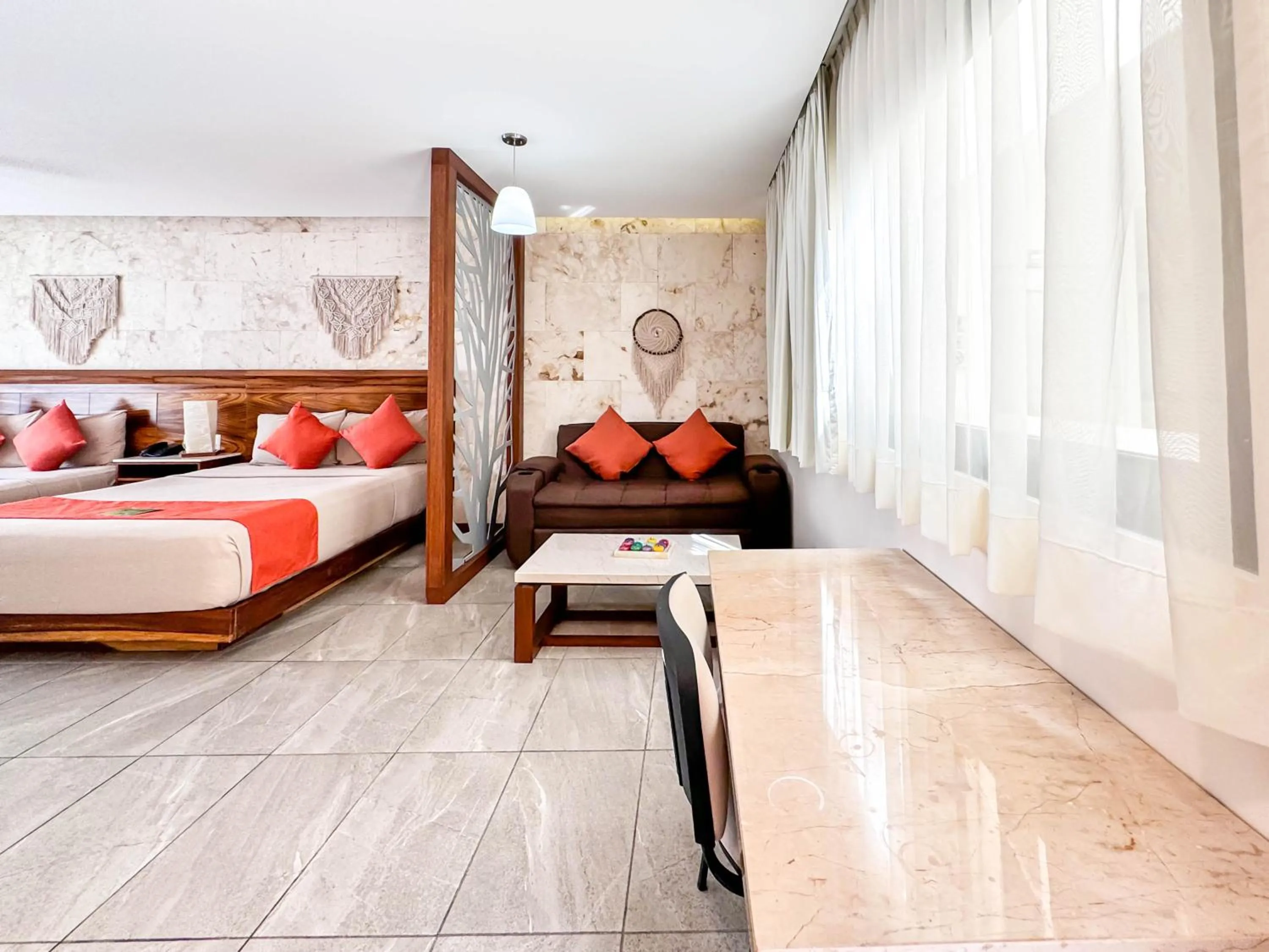 Bed in Grand Fifty Suites