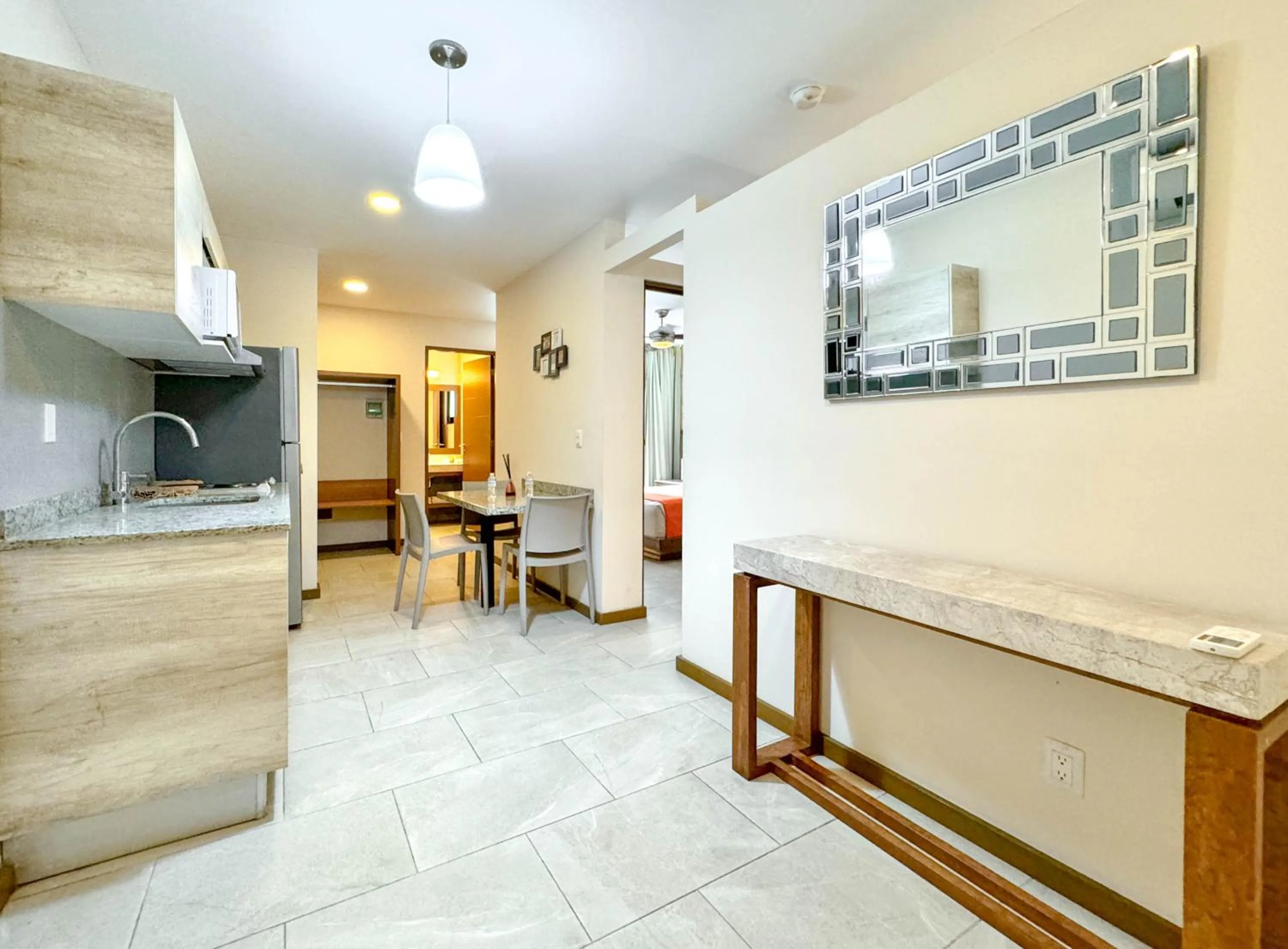 Kitchen or kitchenette in Grand Fifty Suites