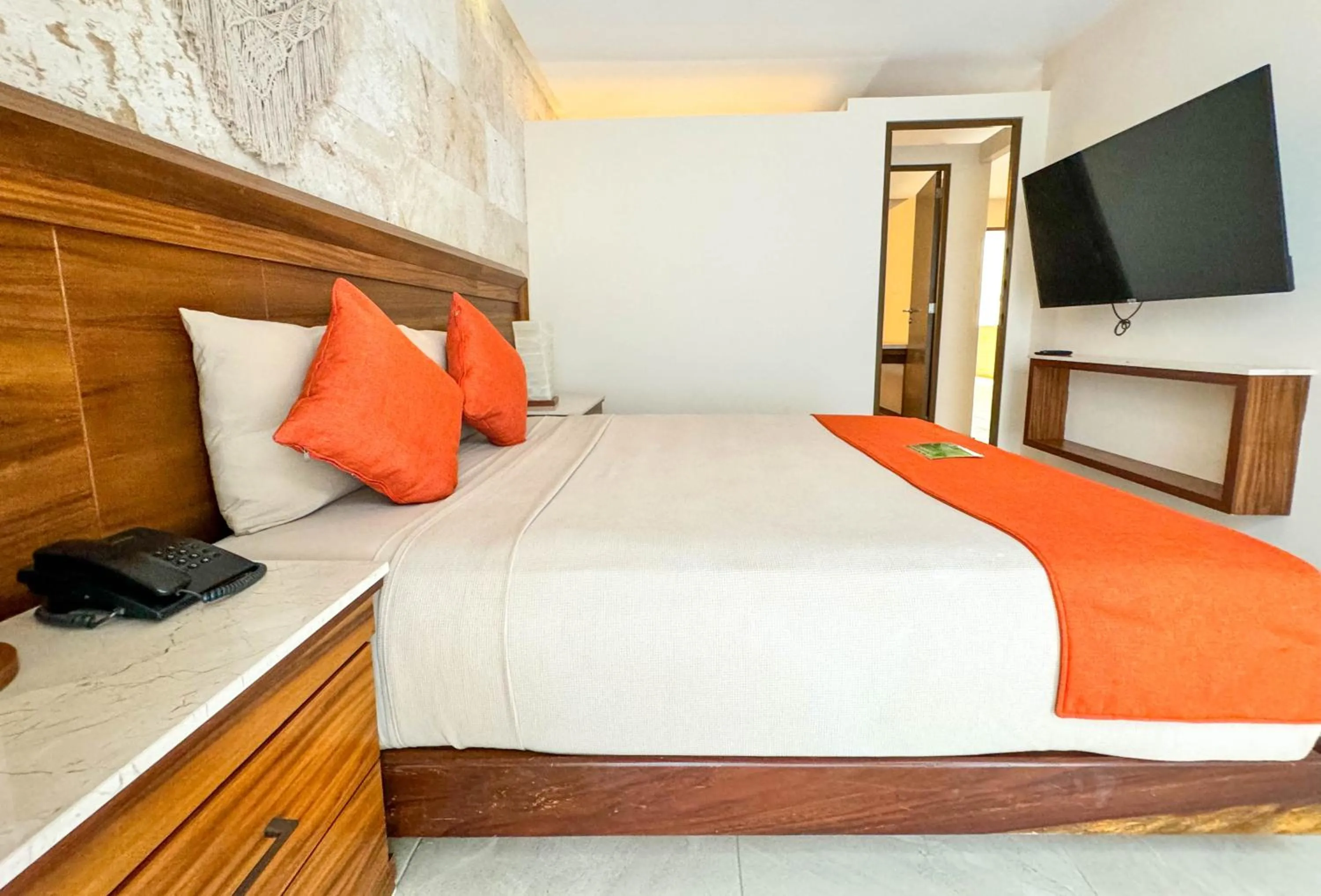 Bed in Grand Fifty Suites