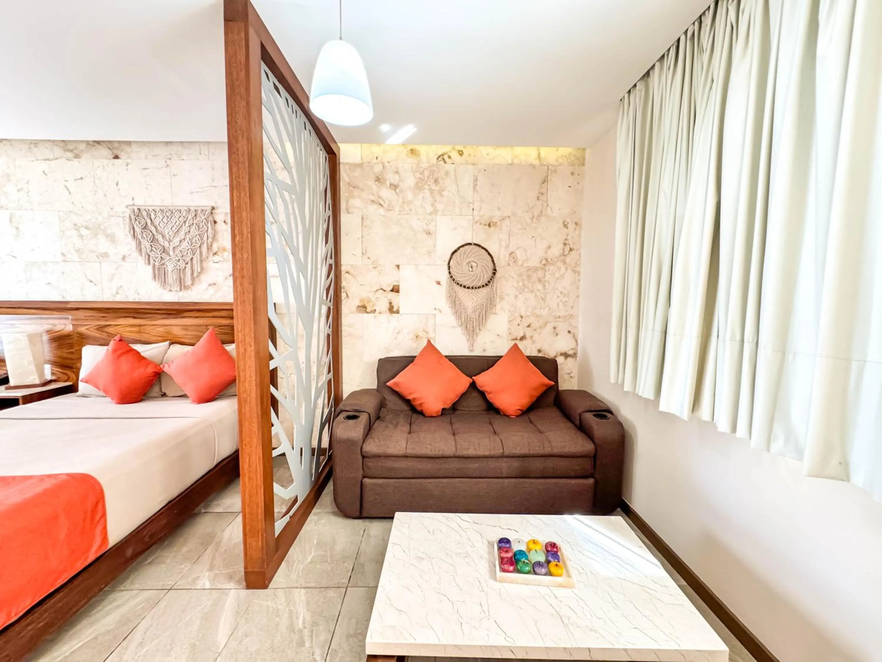 Living room, Bed in Grand Fifty Suites