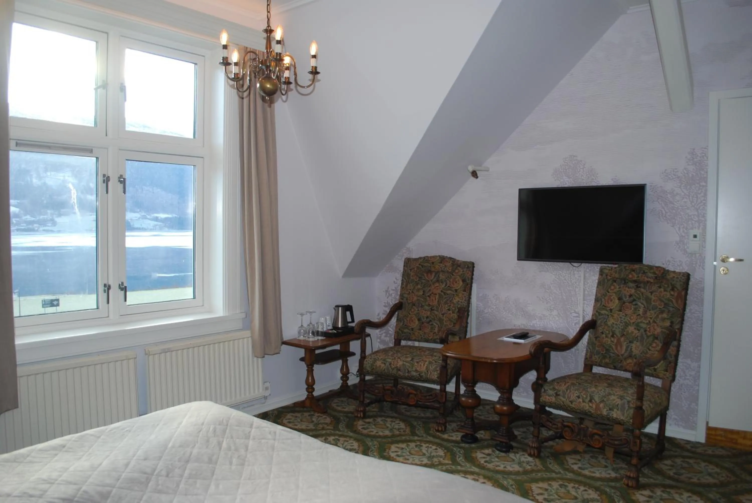 Seating area, Bed in Fleischer's Hotel