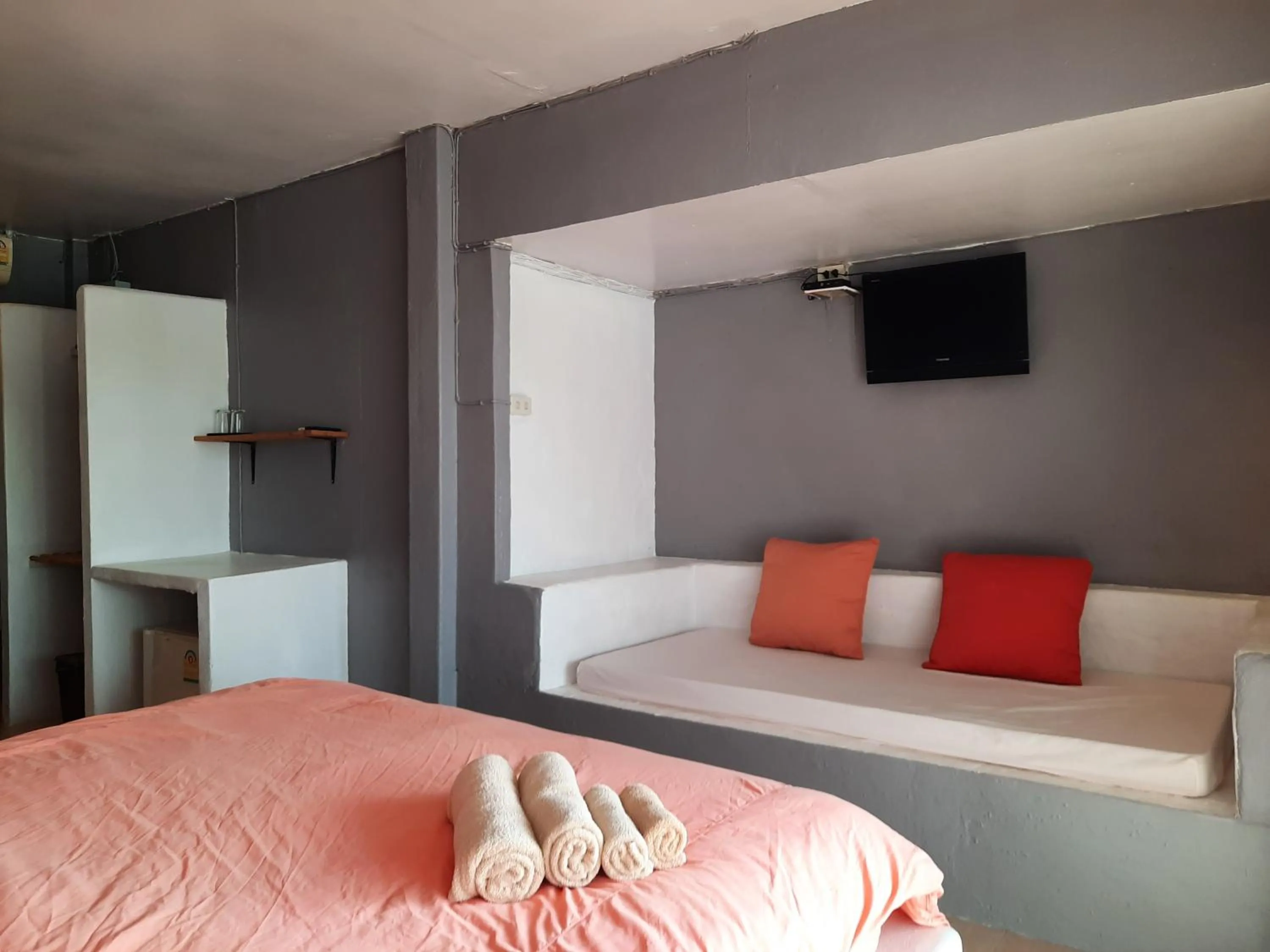 Bed in Chasorn Riverside Resort