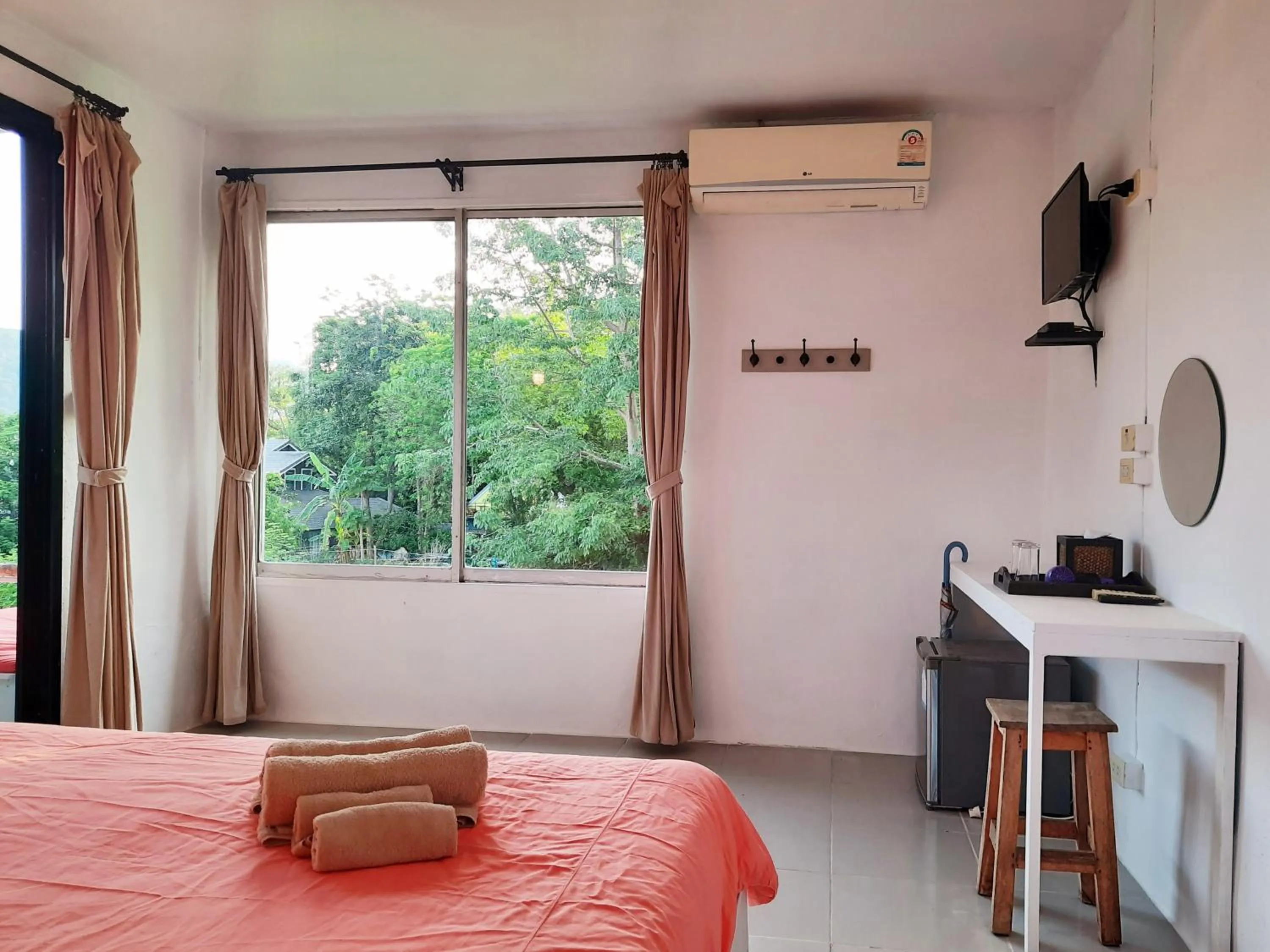 Photo of the whole room, Bed in Chasorn Riverside Resort