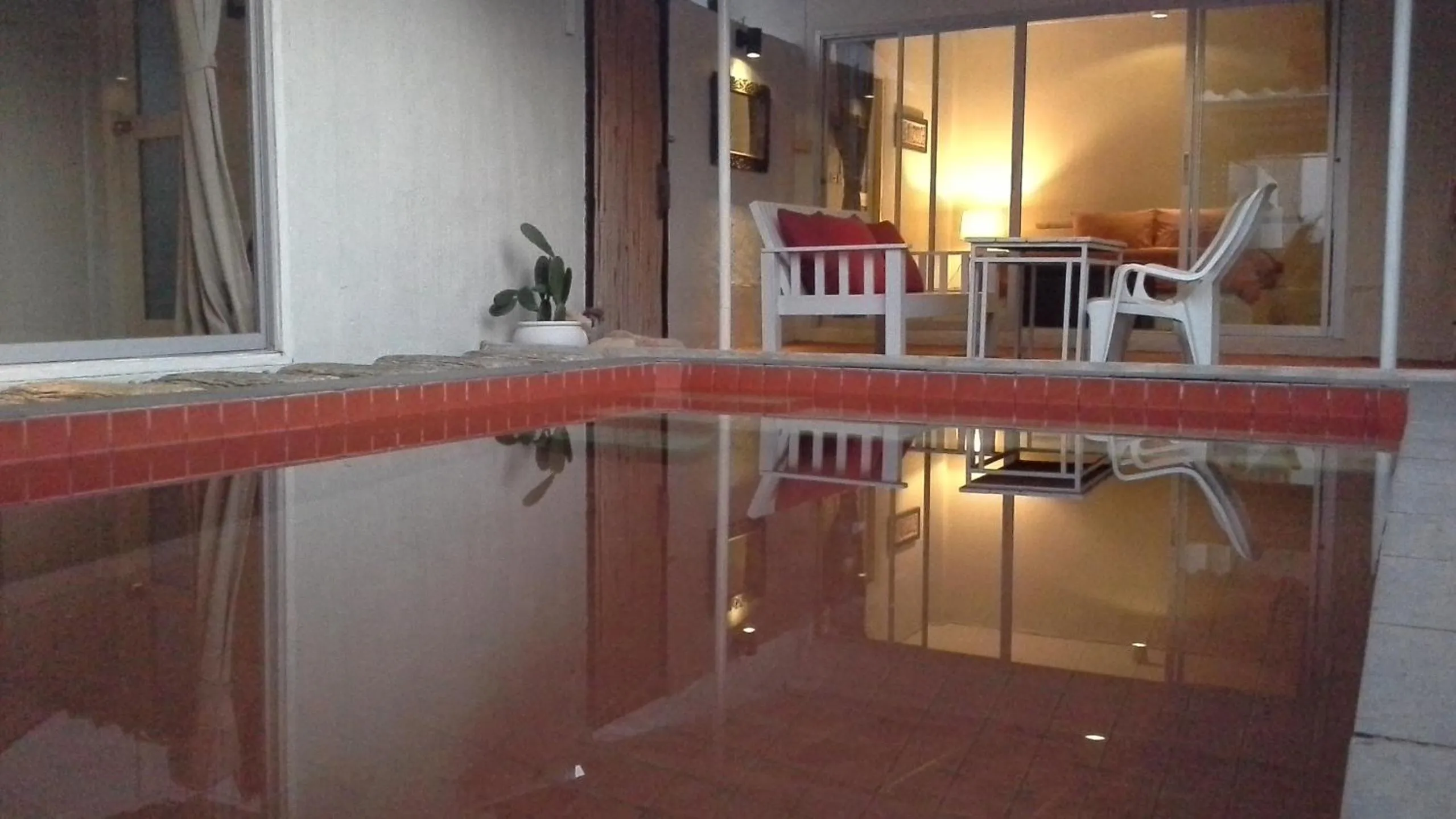 Photo of the whole room in Chasorn Riverside Resort