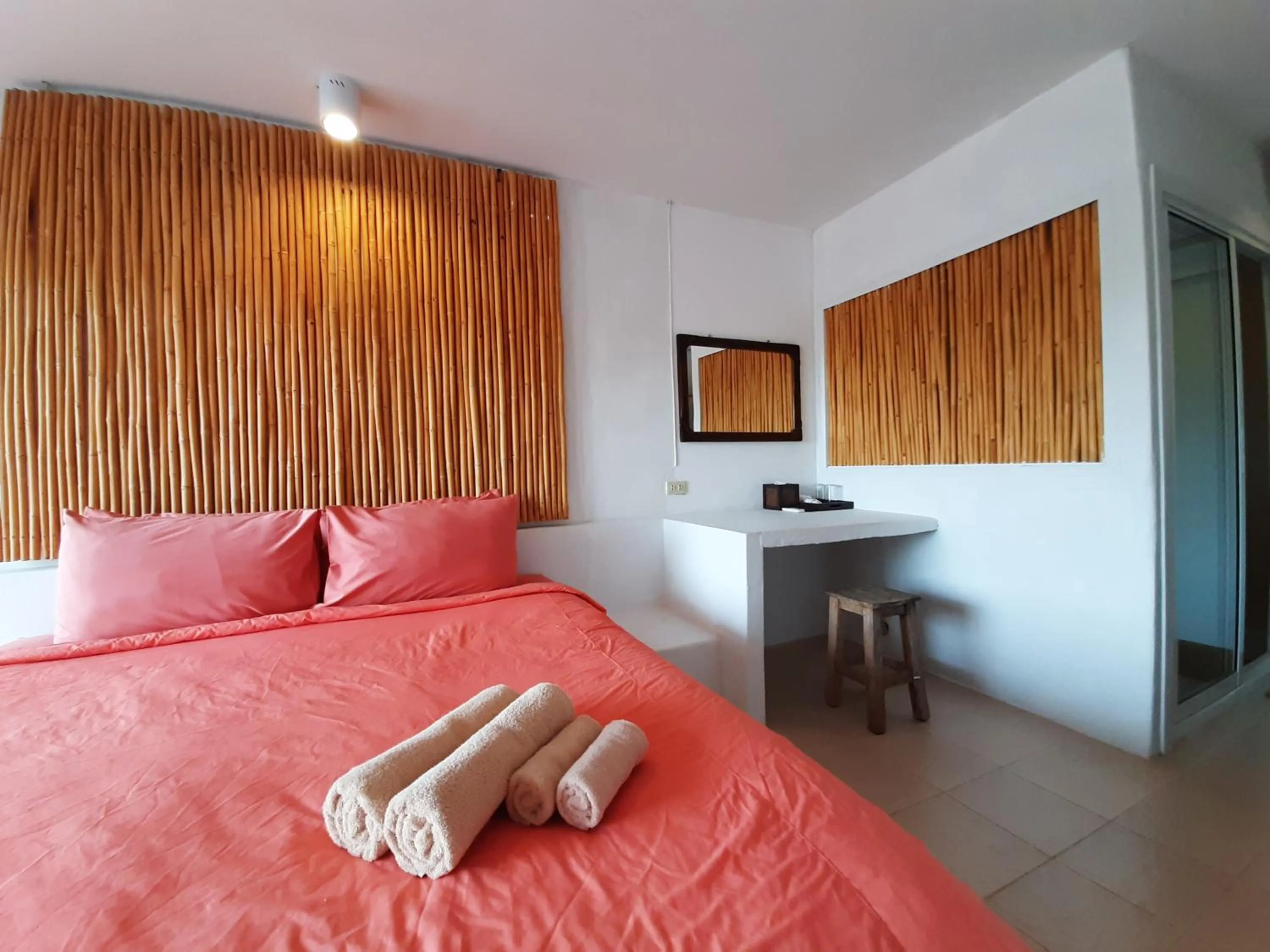 Bed in Chasorn Riverside Resort