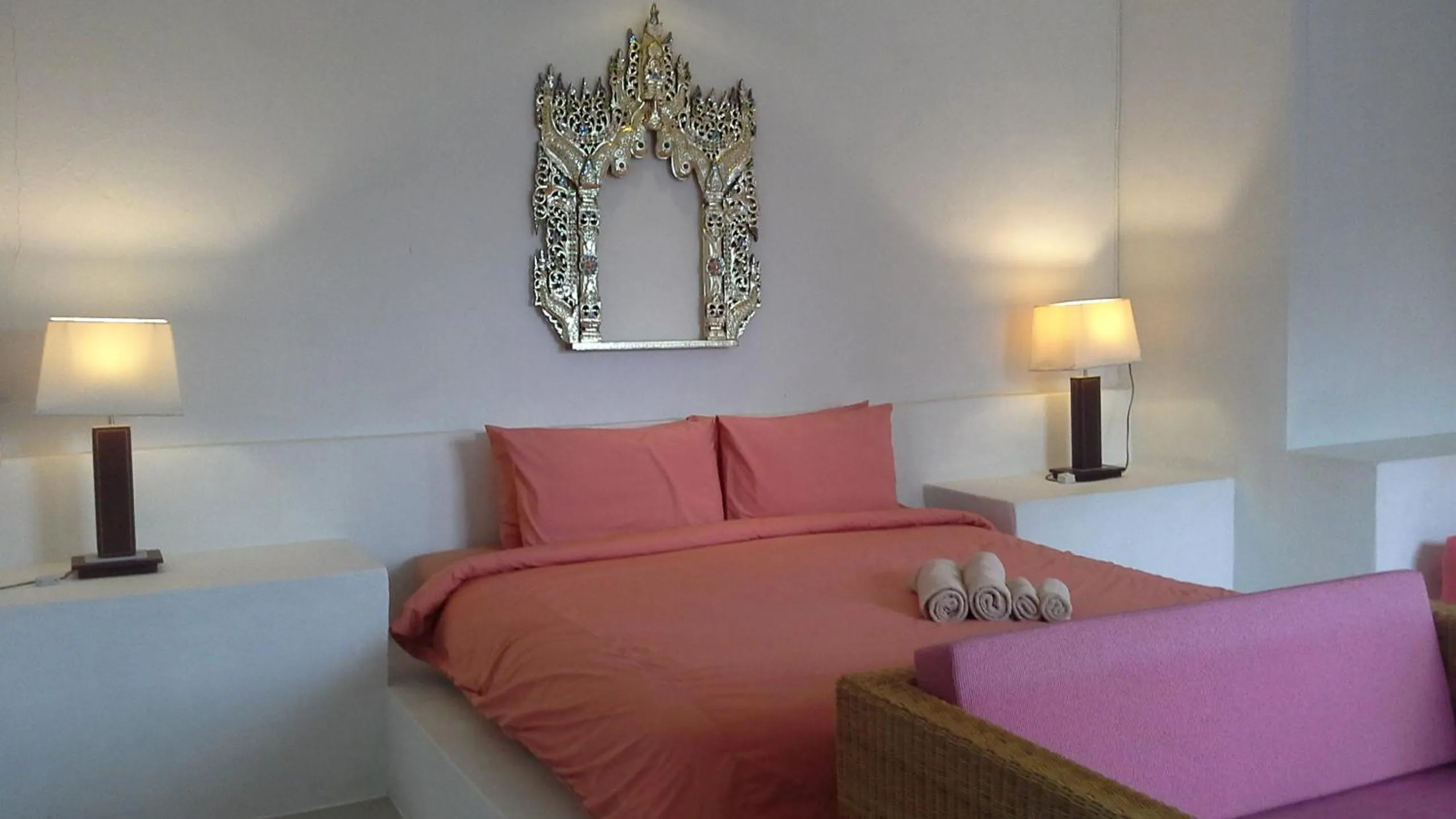 Bed in Chasorn Riverside Resort