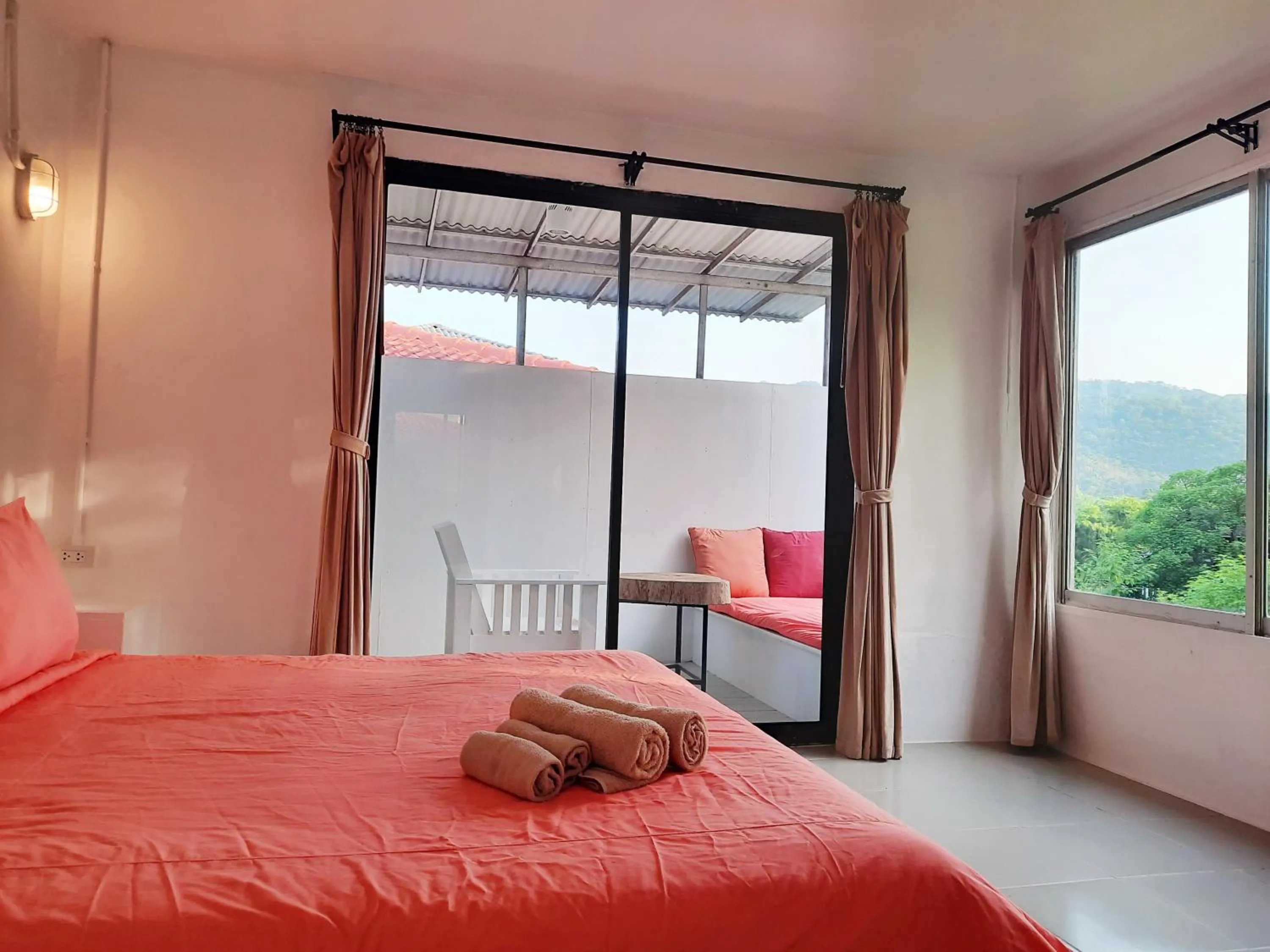 Bed in Chasorn Riverside Resort