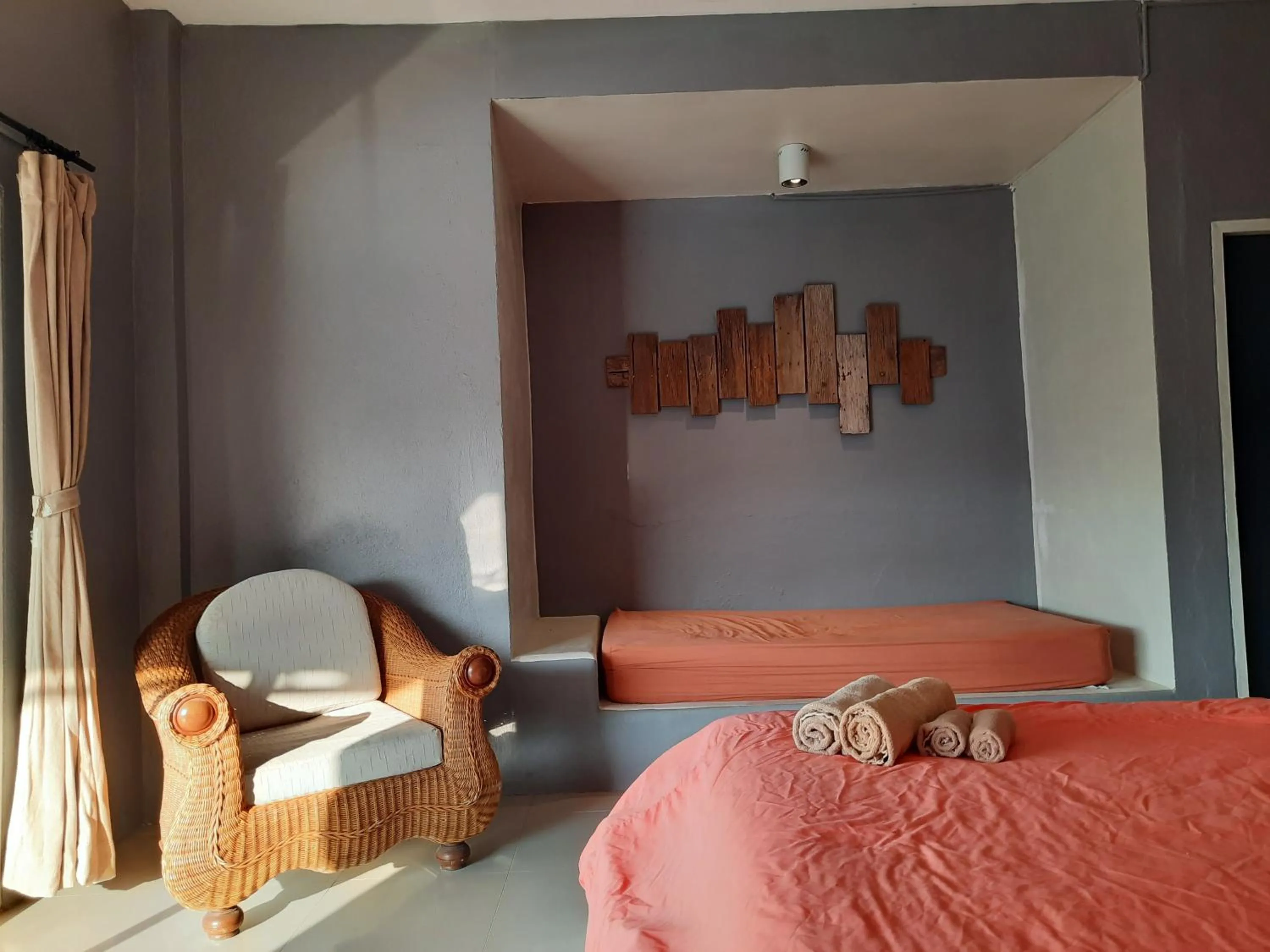 Bed in Chasorn Riverside Resort