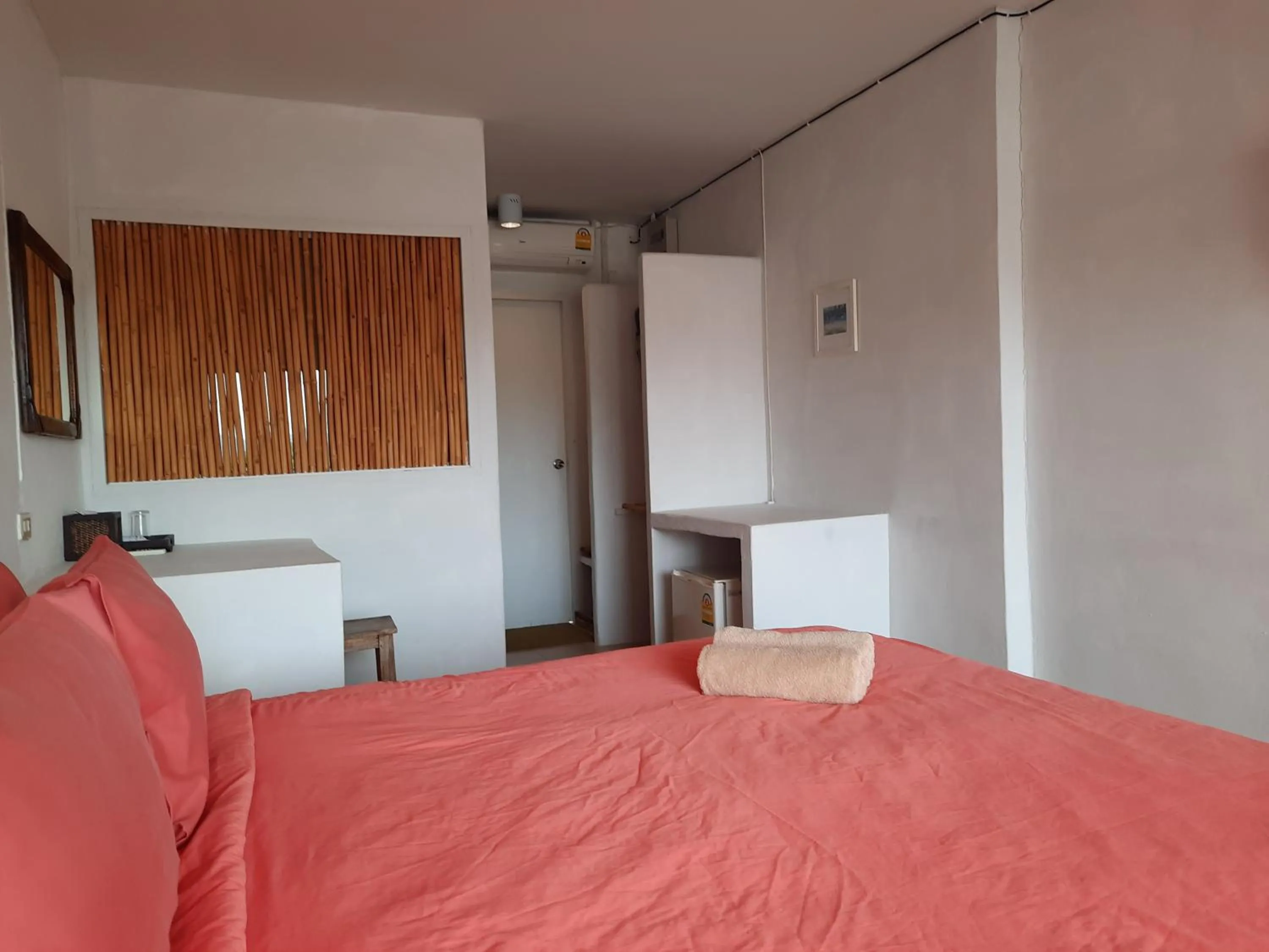 Bed in Chasorn Riverside Resort