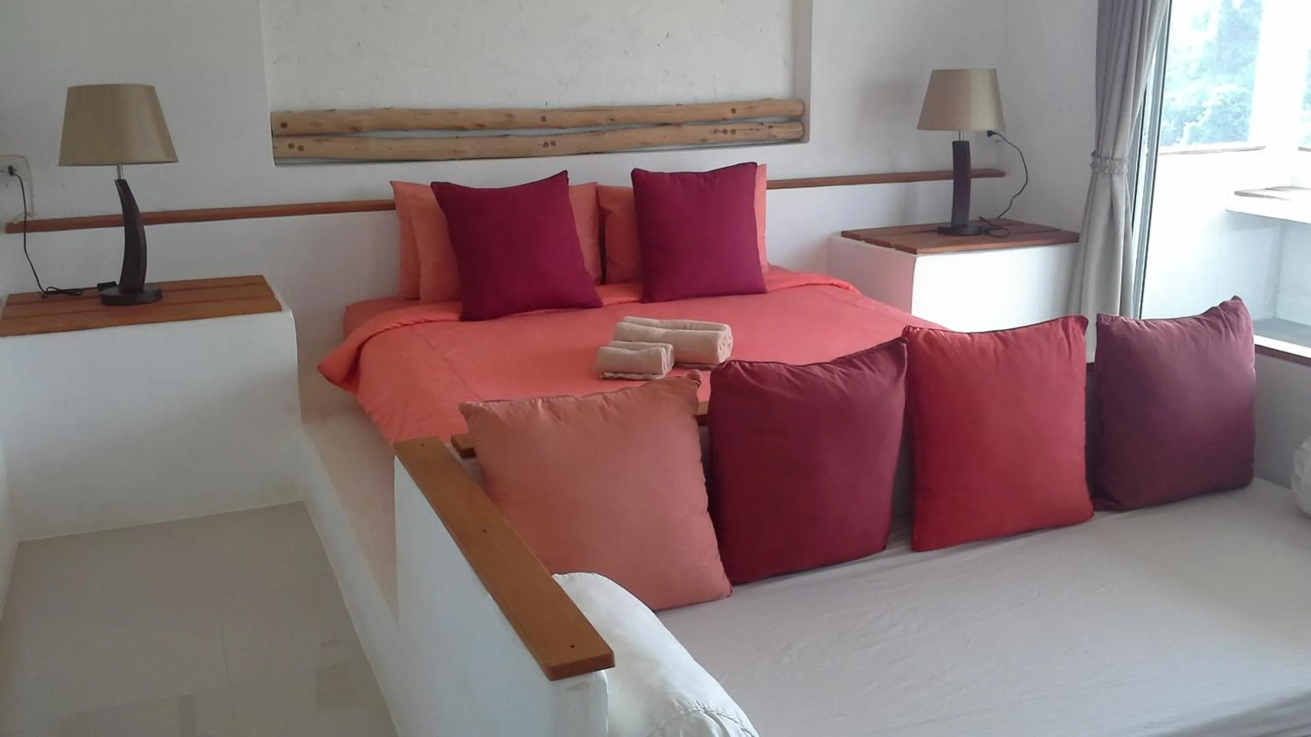 Bed in Chasorn Riverside Resort