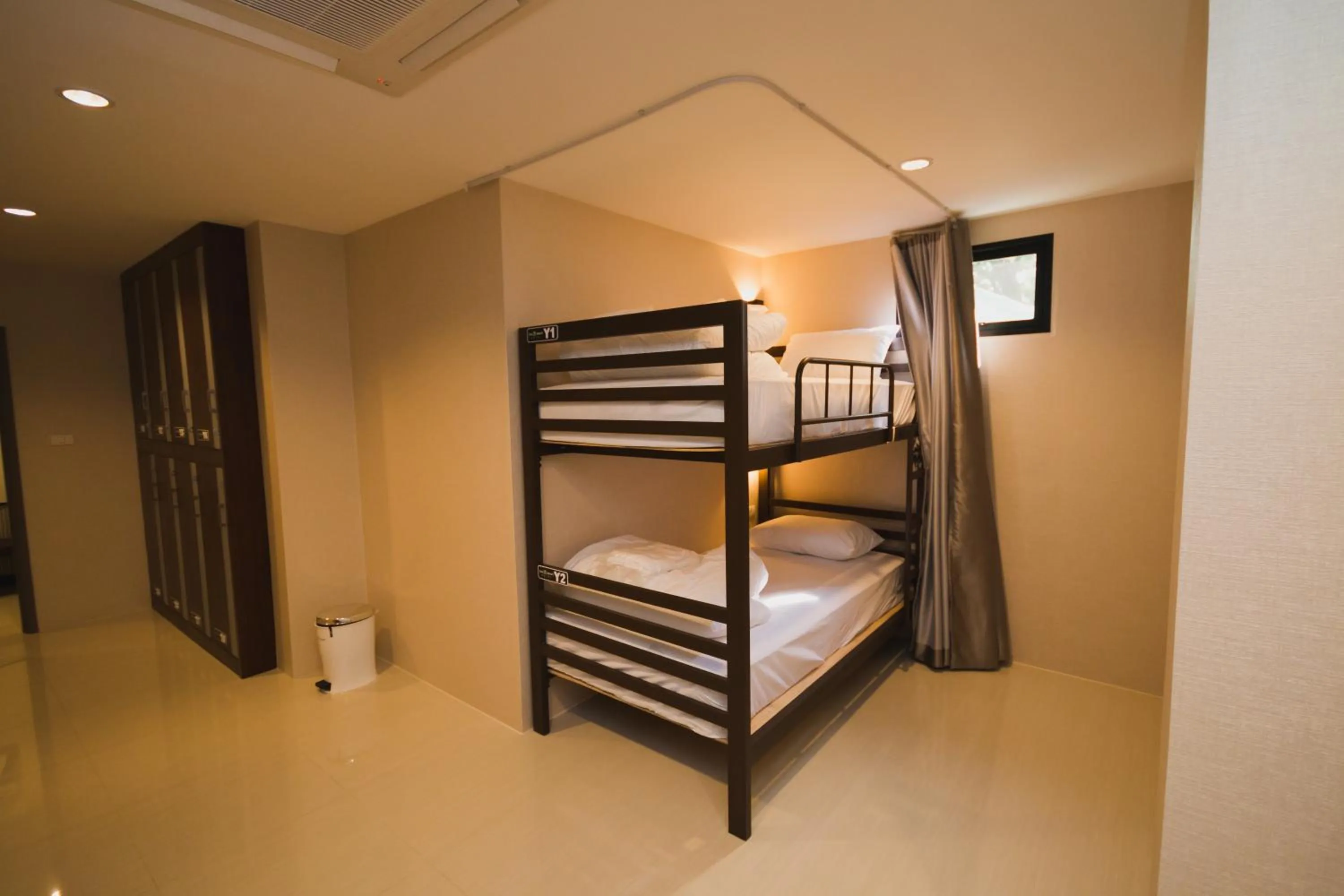 Bed in The Y Smart Hotel